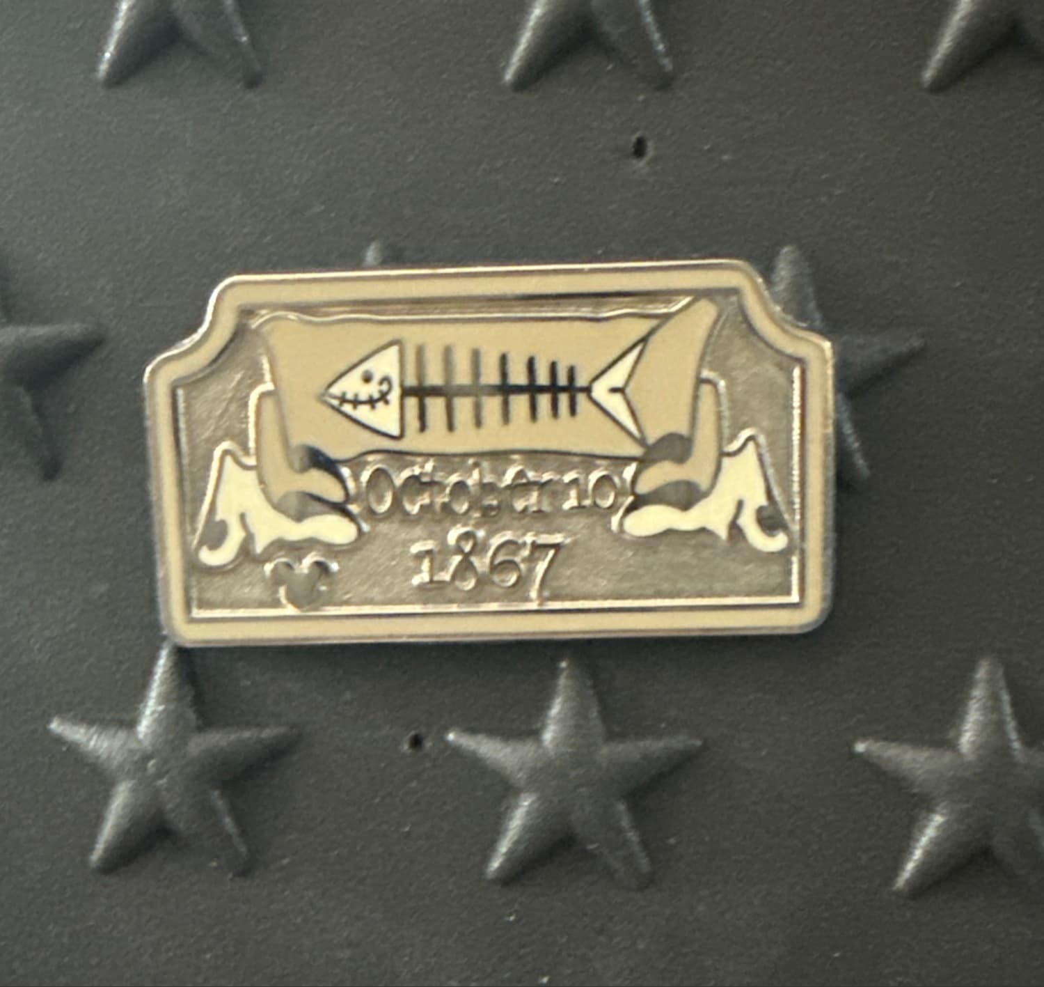 Haunted Mansion Fish Bones Tombstone Hidden Mickey Pin front