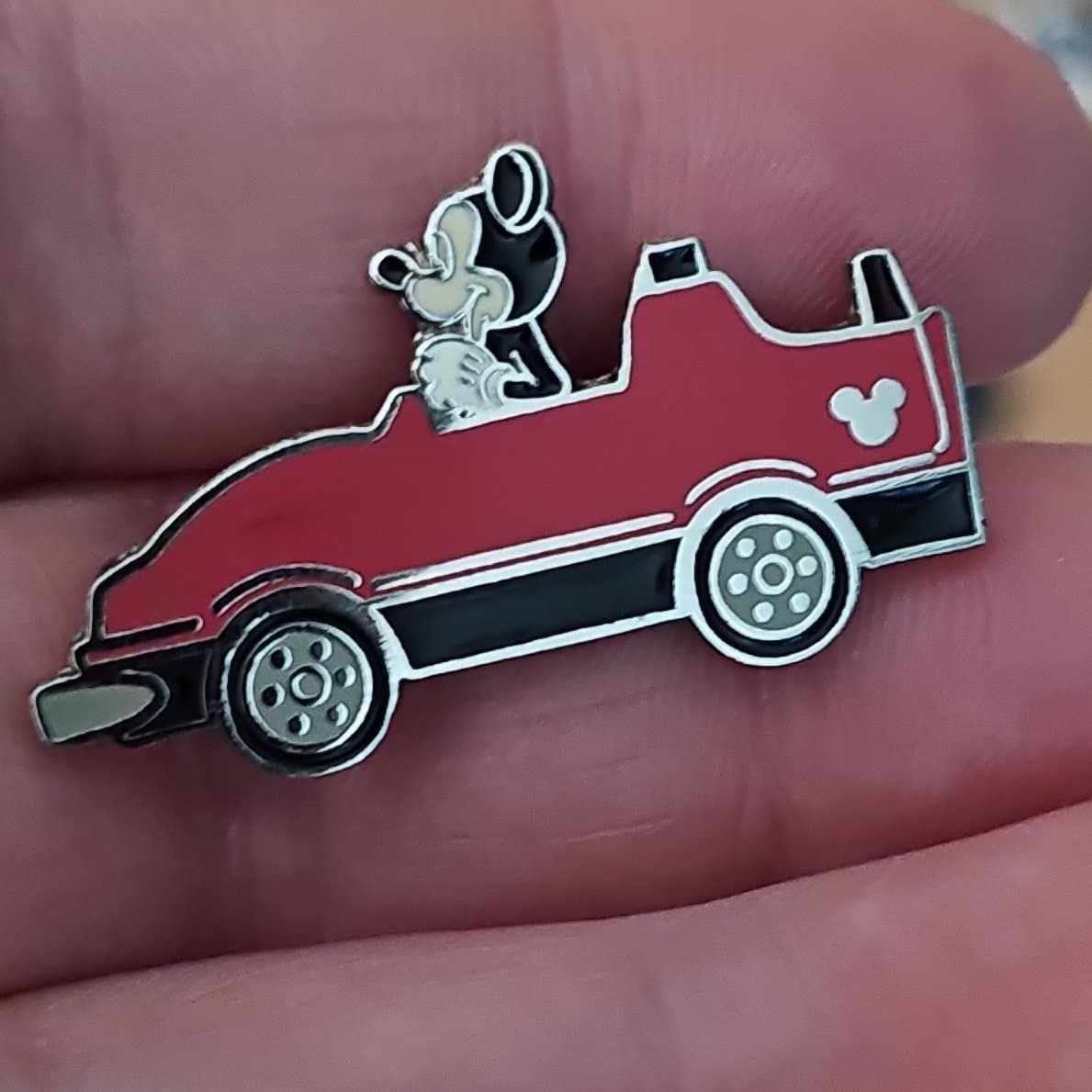 Mickey Mouse Driving a Red Car front