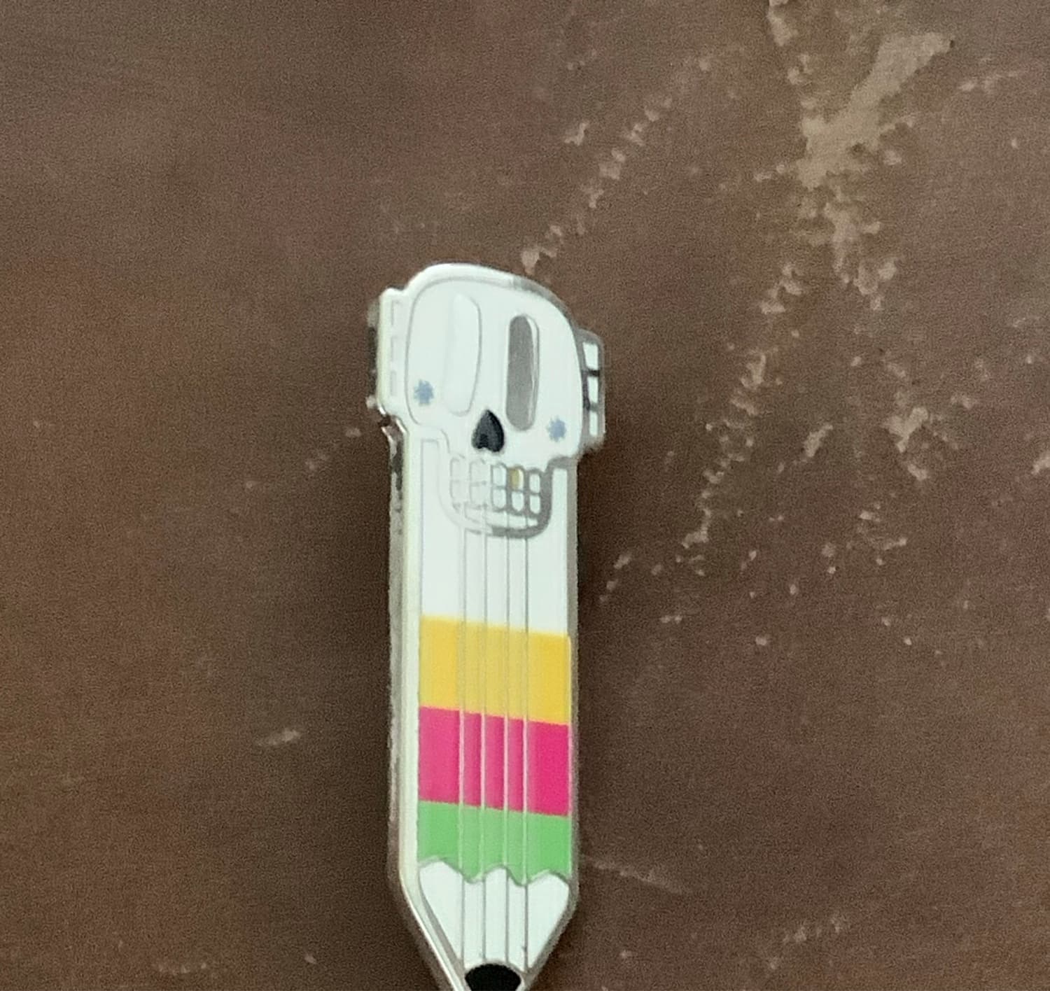 Skull and Pencils Enamel Pin
