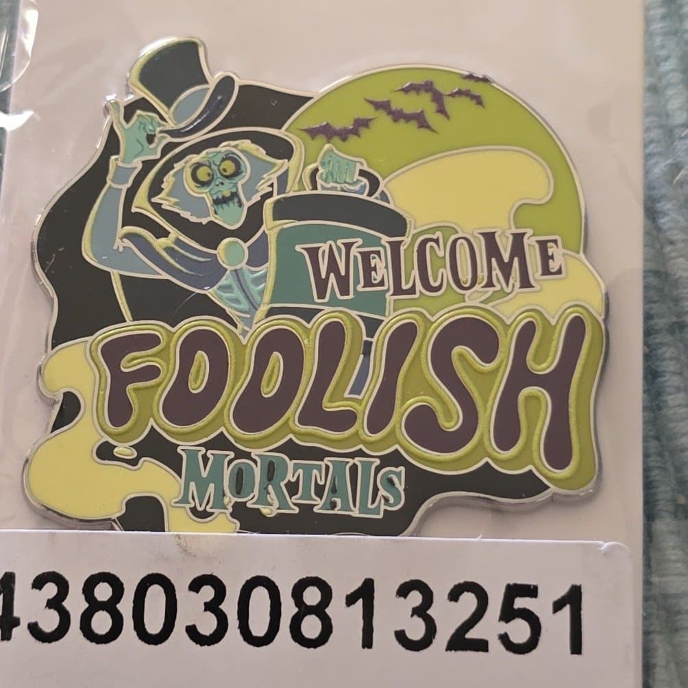The Hatbox Ghost Welcome Foolish Mortals Glow-in-the-Dark Pin – The Haunted Mansion