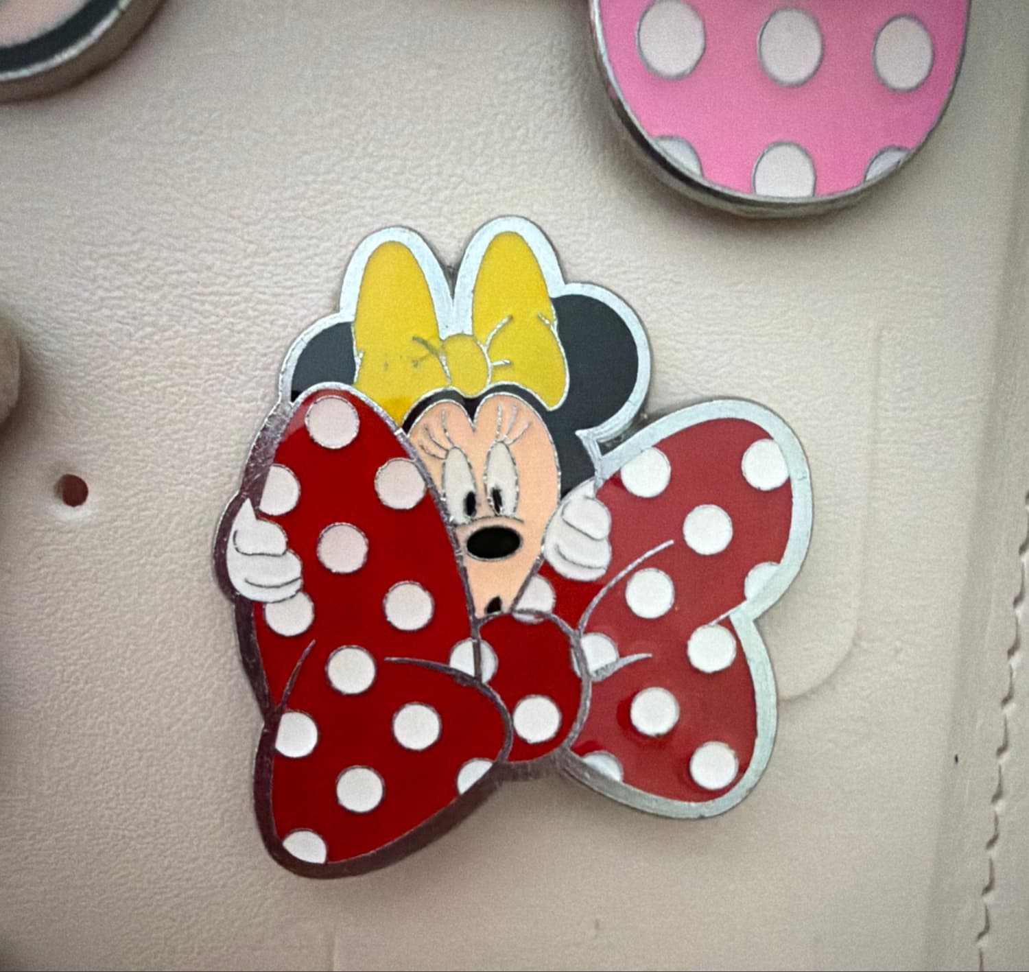 Minnie Mouse Peeking from Behind a Red Polka-Dot Bow by MII