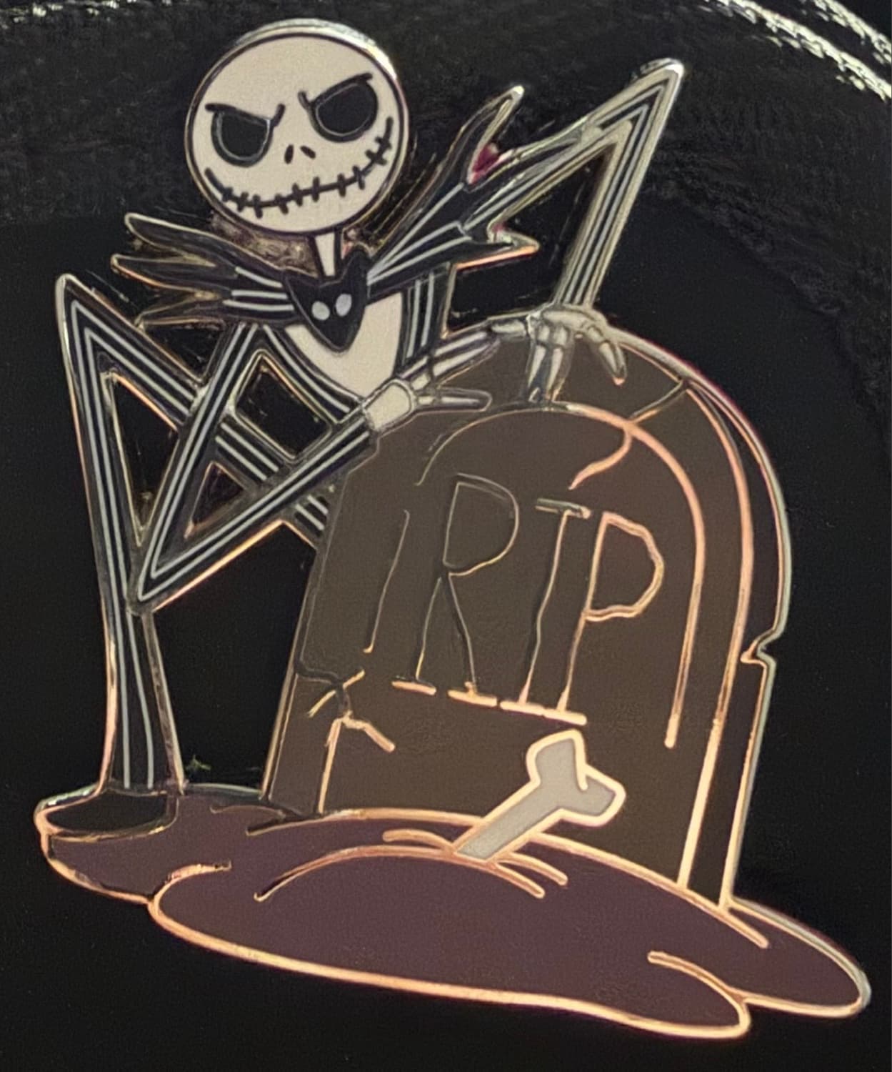 Jack Skellington behind R.I.P. Grave front