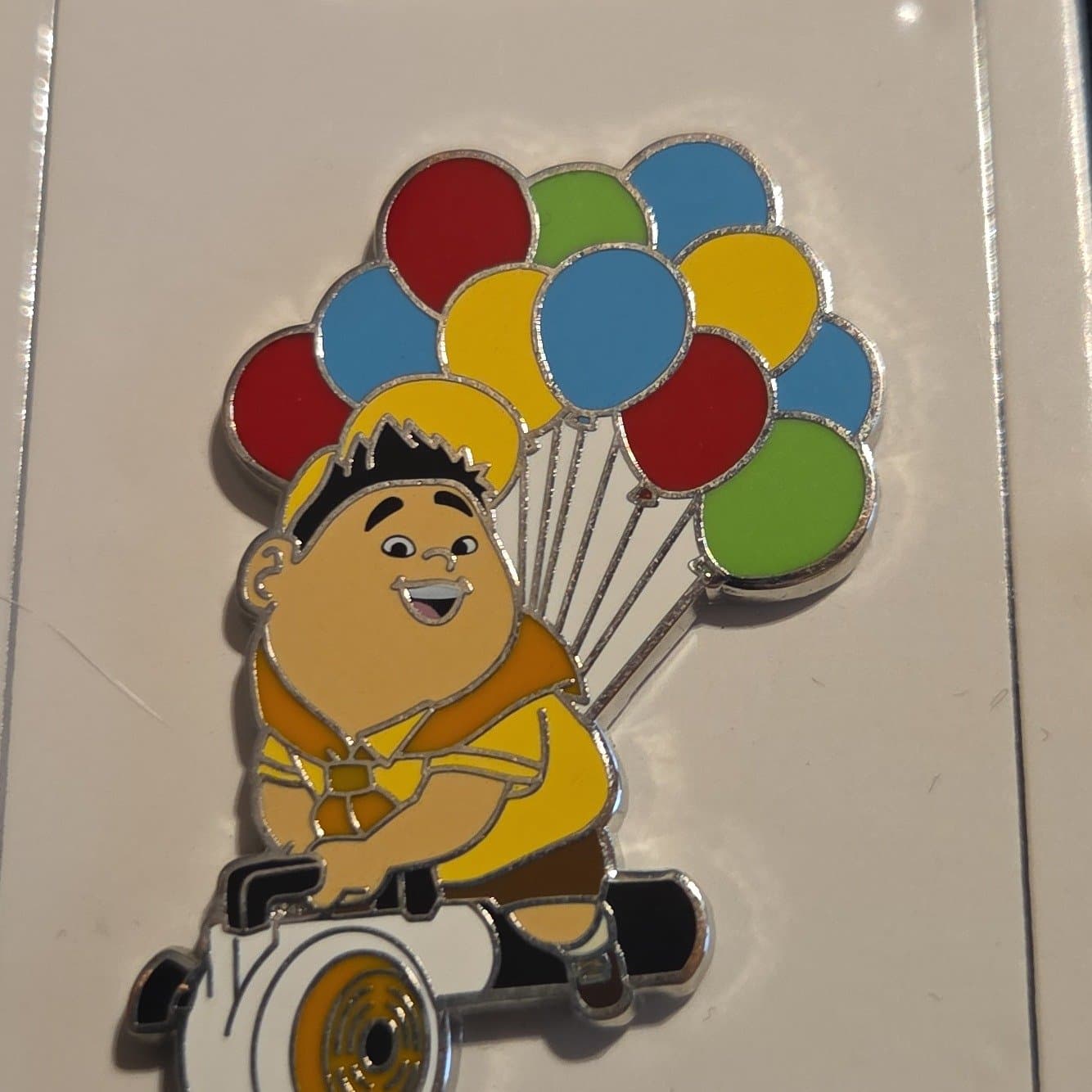 Russell Riding a Leaf Blower with Balloons - Up