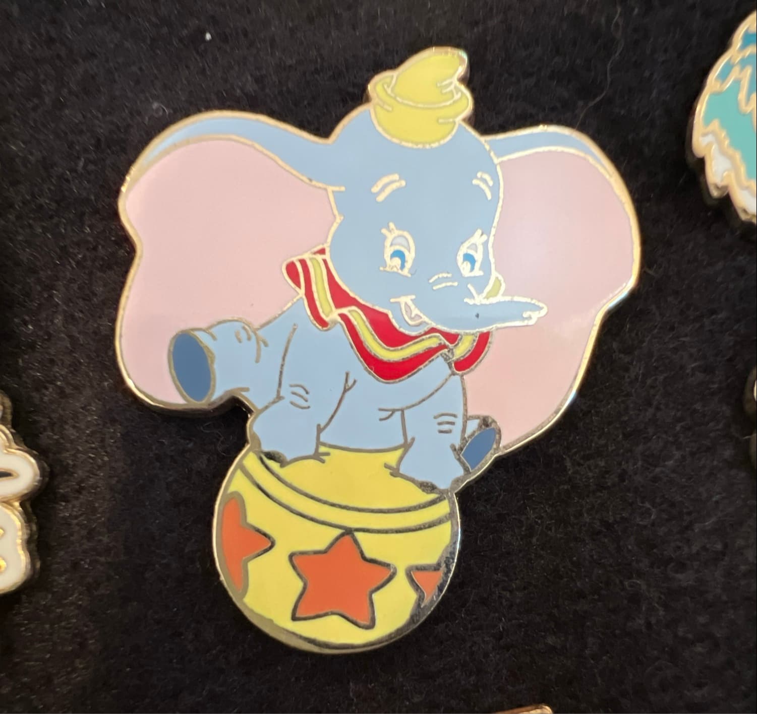 Dumbo Sitting on a Yellow Circus Ball