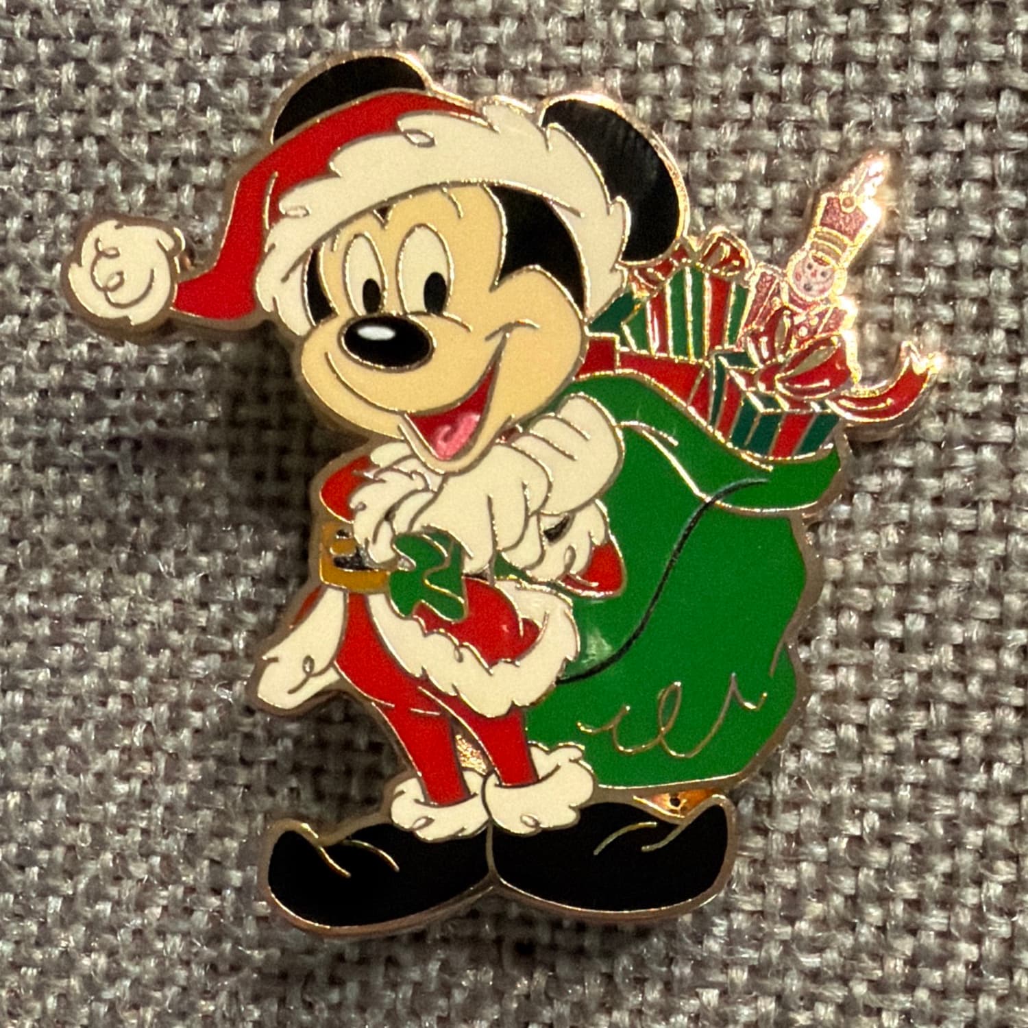 Mickey Mouse as Santa with Toy Bag and Nutcracker front
