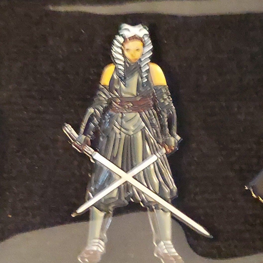 Ashoka with crossed lightsabers front