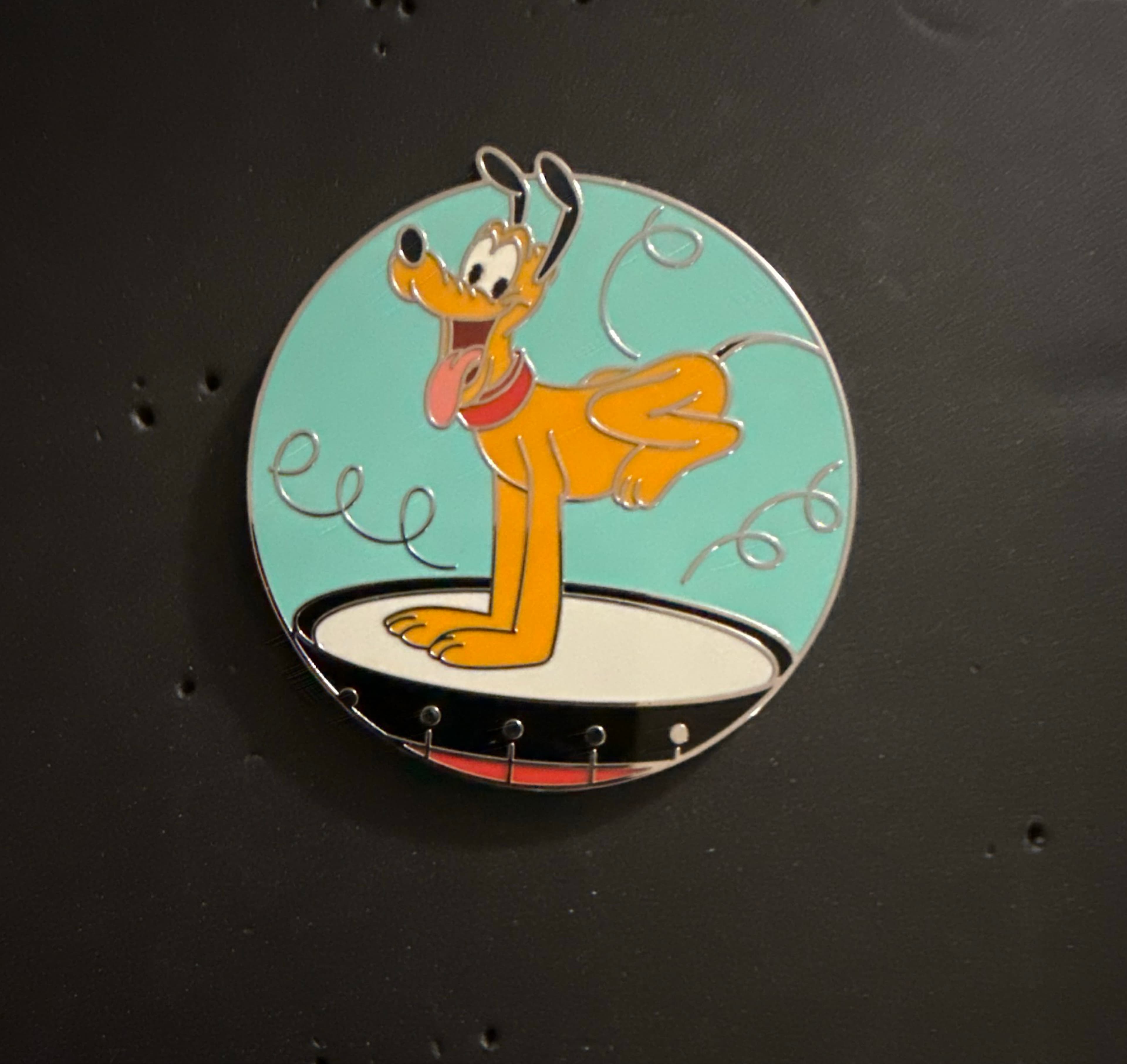Pluto on Drum front