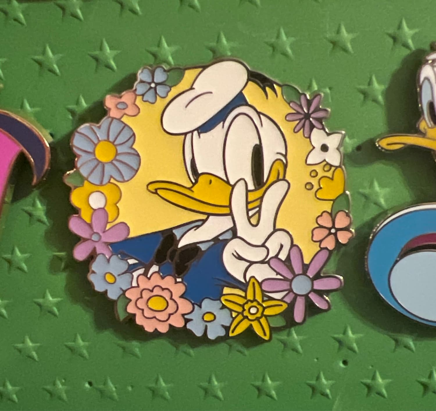 Disney Donald Duck Flower Peace Sign Pin front