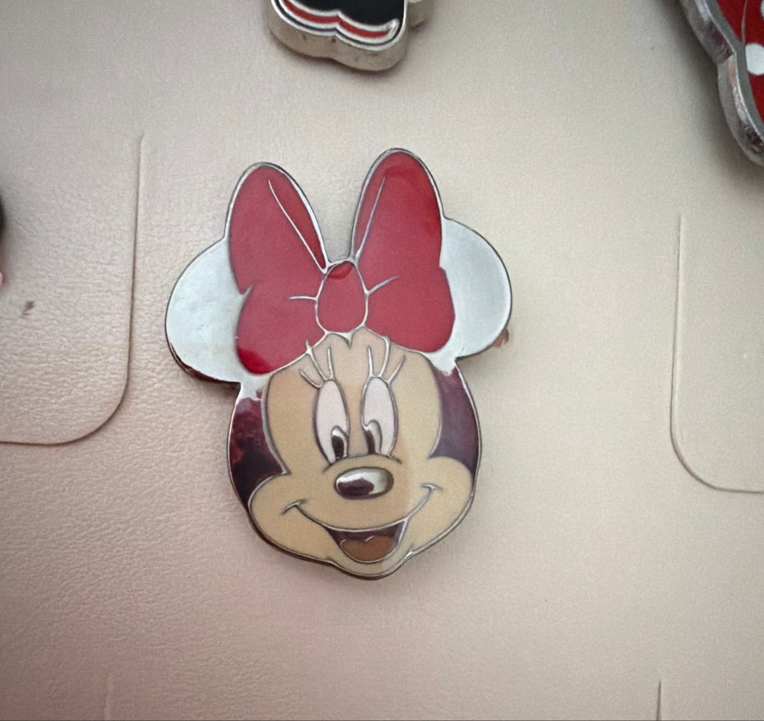 Silver Minnie Mouse Smiling Face with Red Bow