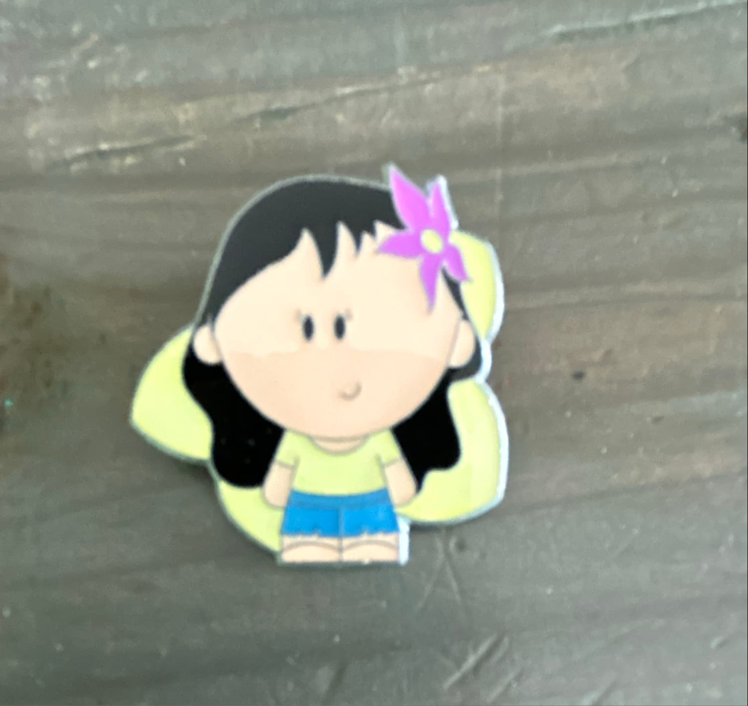 Stylized Hawaiian Girl with Purple Flower Pin