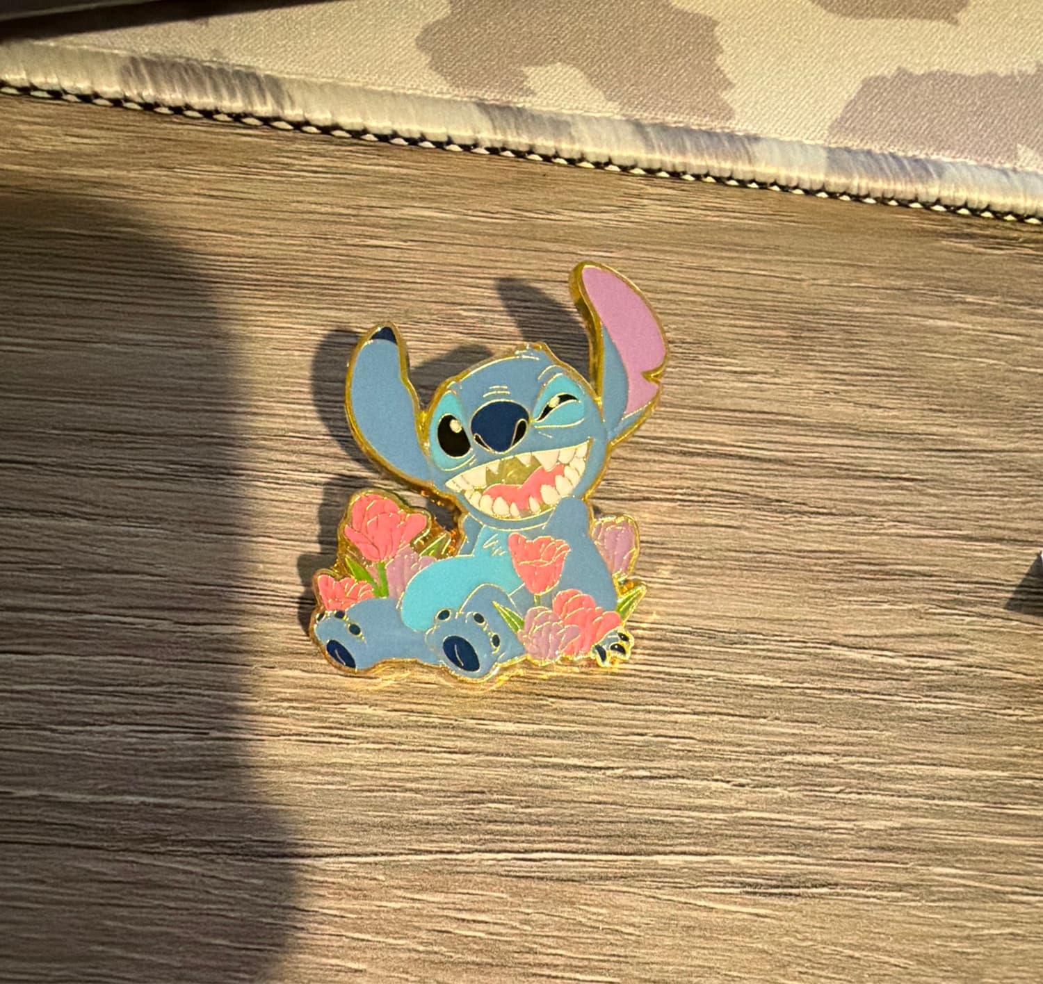 Loungefly Disney Lilo & Stitch Enamel Pin Sitting in Flowers Tulips front