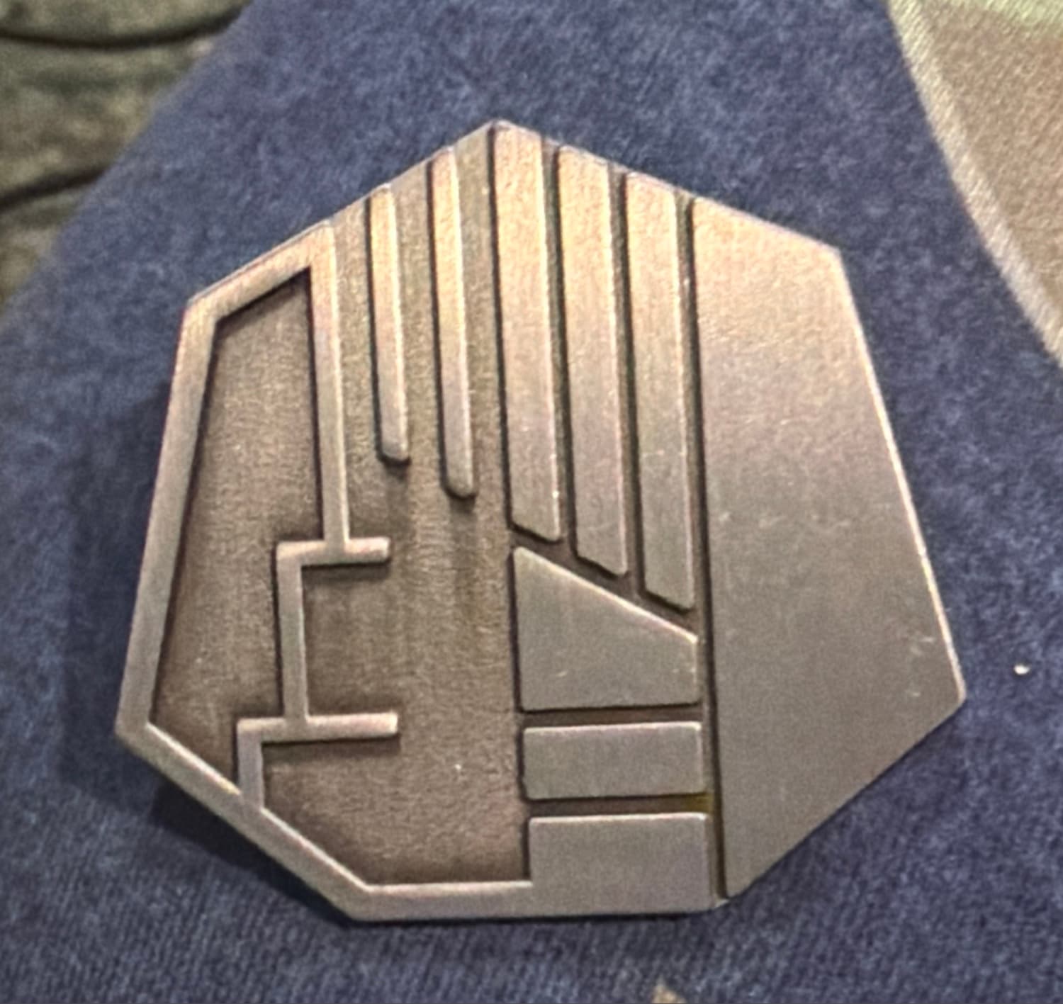Savi’s workshop pin