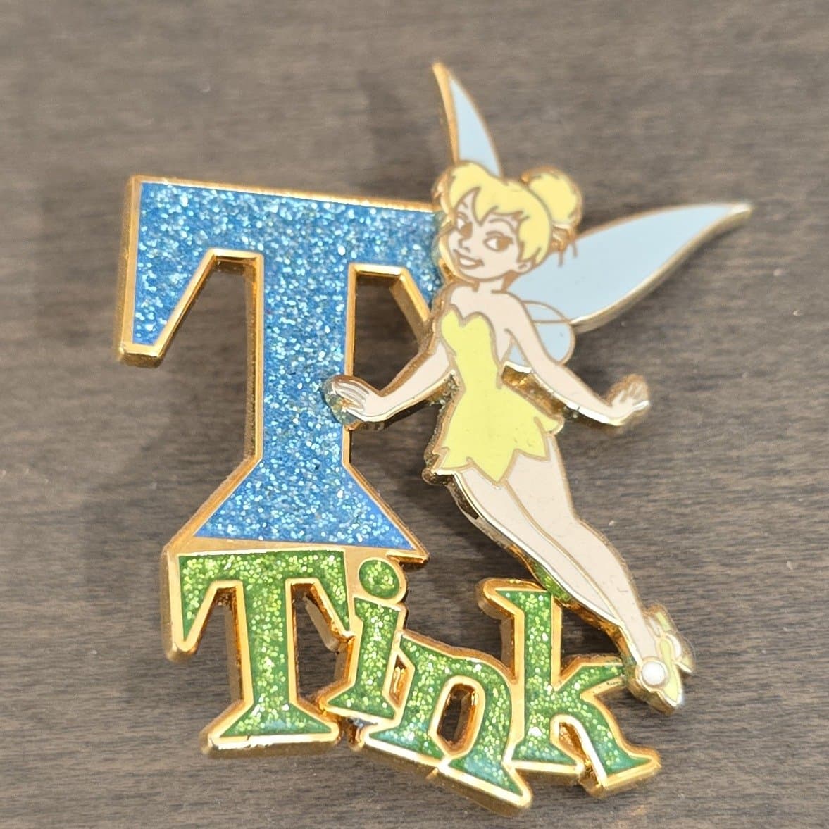 Tinker Bell Glittered 'T' Pin front
