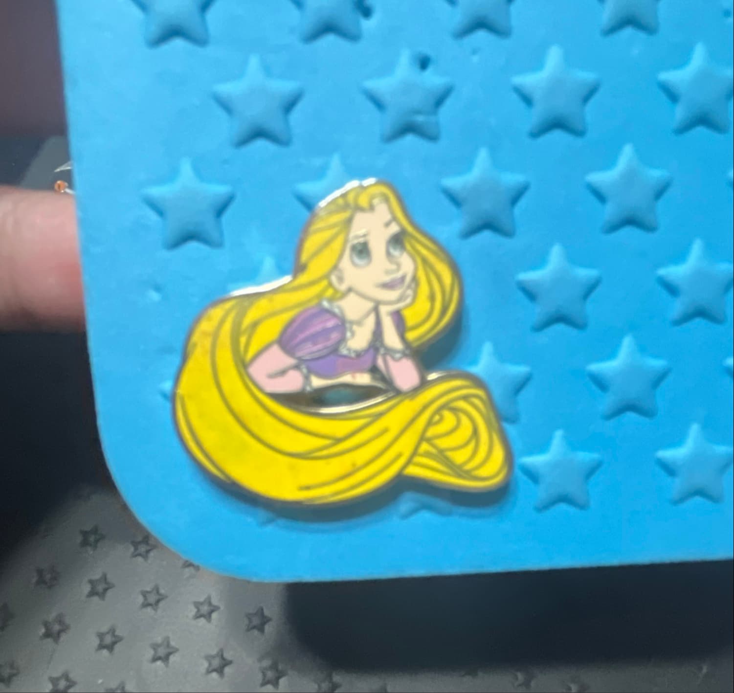 Rapunzel Leaning on Hand