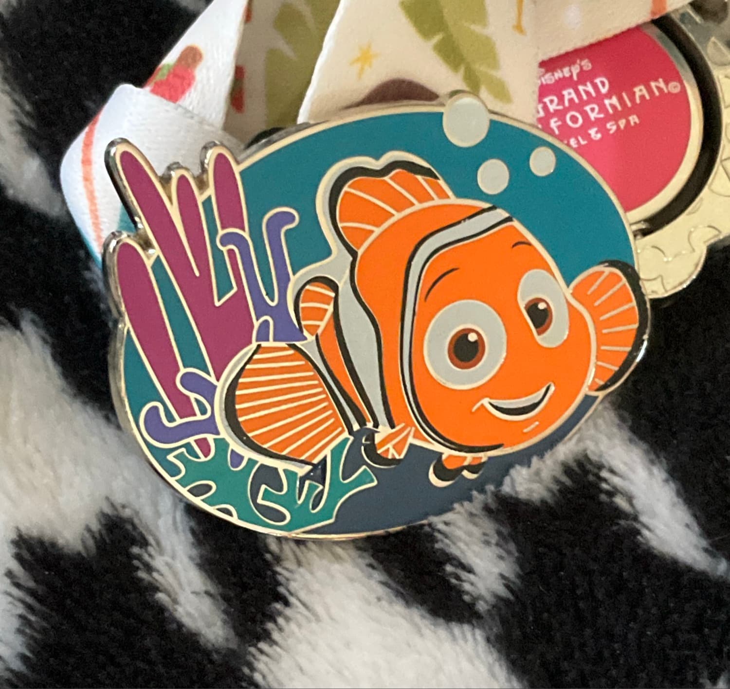 Nemo Swimming with Coral and Bubbles front
