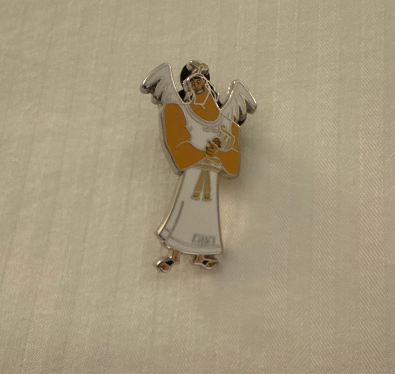 Kronk as an Angel with Wings and Book
