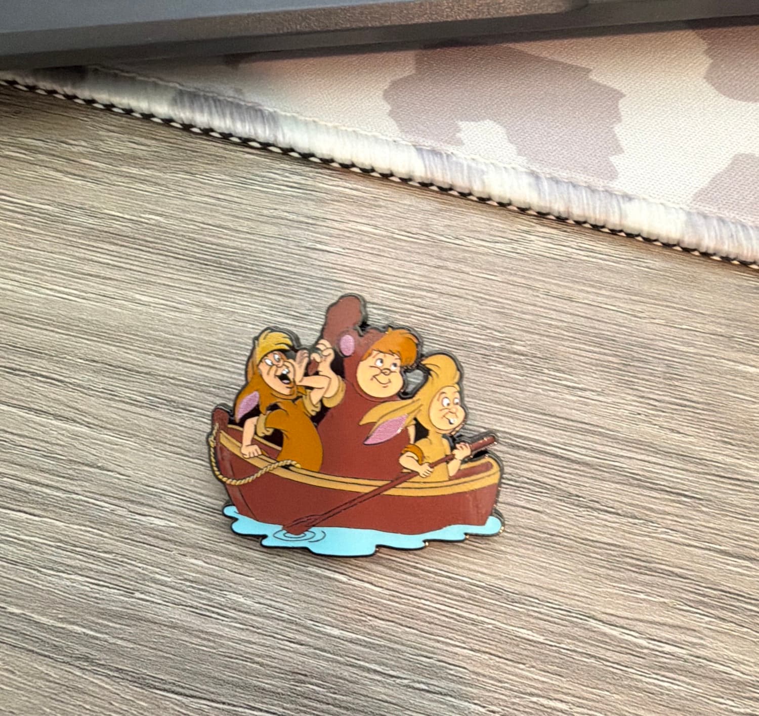 Three Lost Boys Rowing a Boat