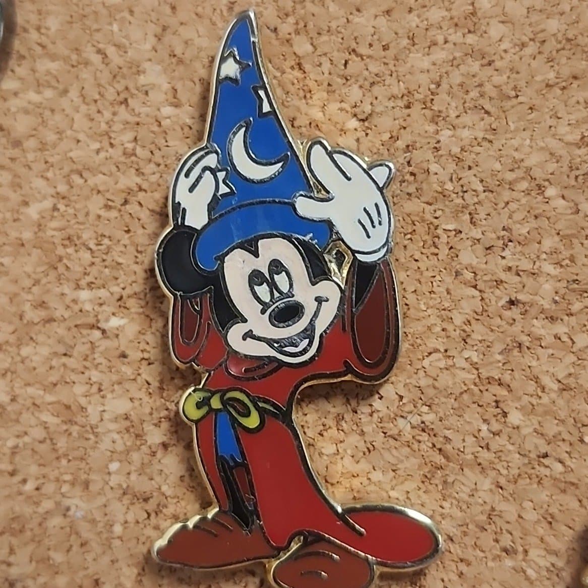 Sorcerer Mickey Putting on Hat front