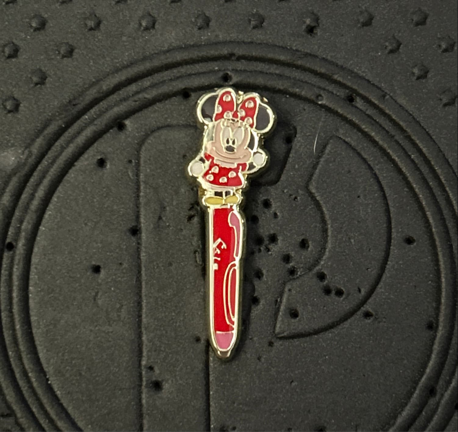 Minnie Mouse Standing with Red Pen 'Minnie' Text Pin