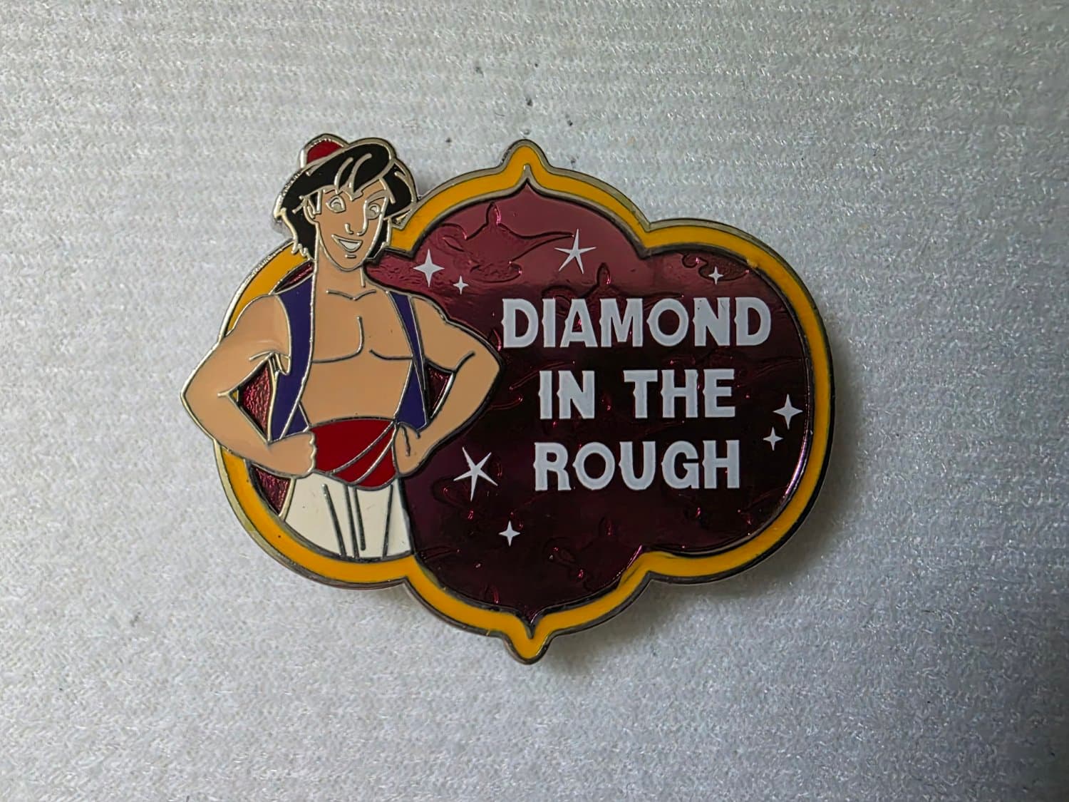 Aladdin "Diamond in the rough" front