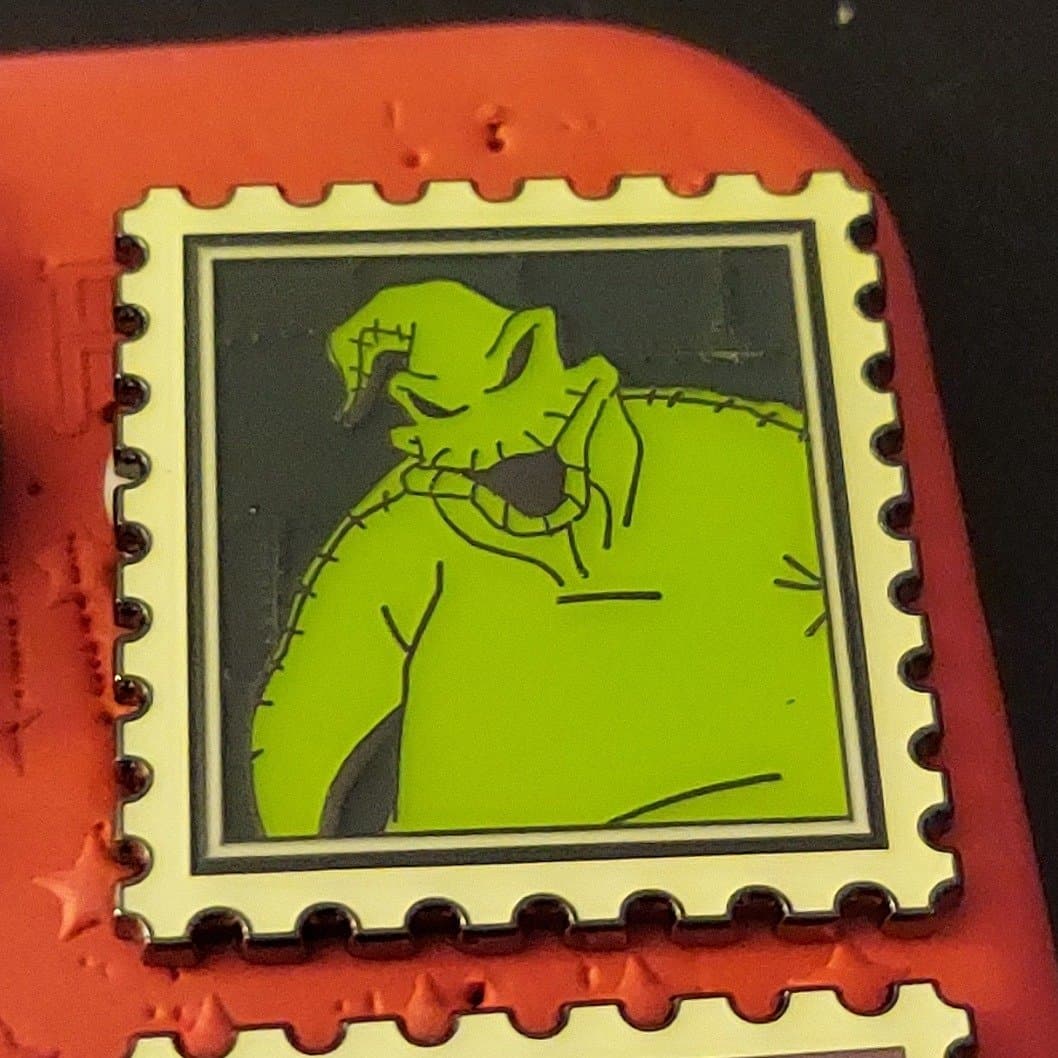 Nightmare Before Christmas Oogie Boogie Postage Stamp Enamel Pin front