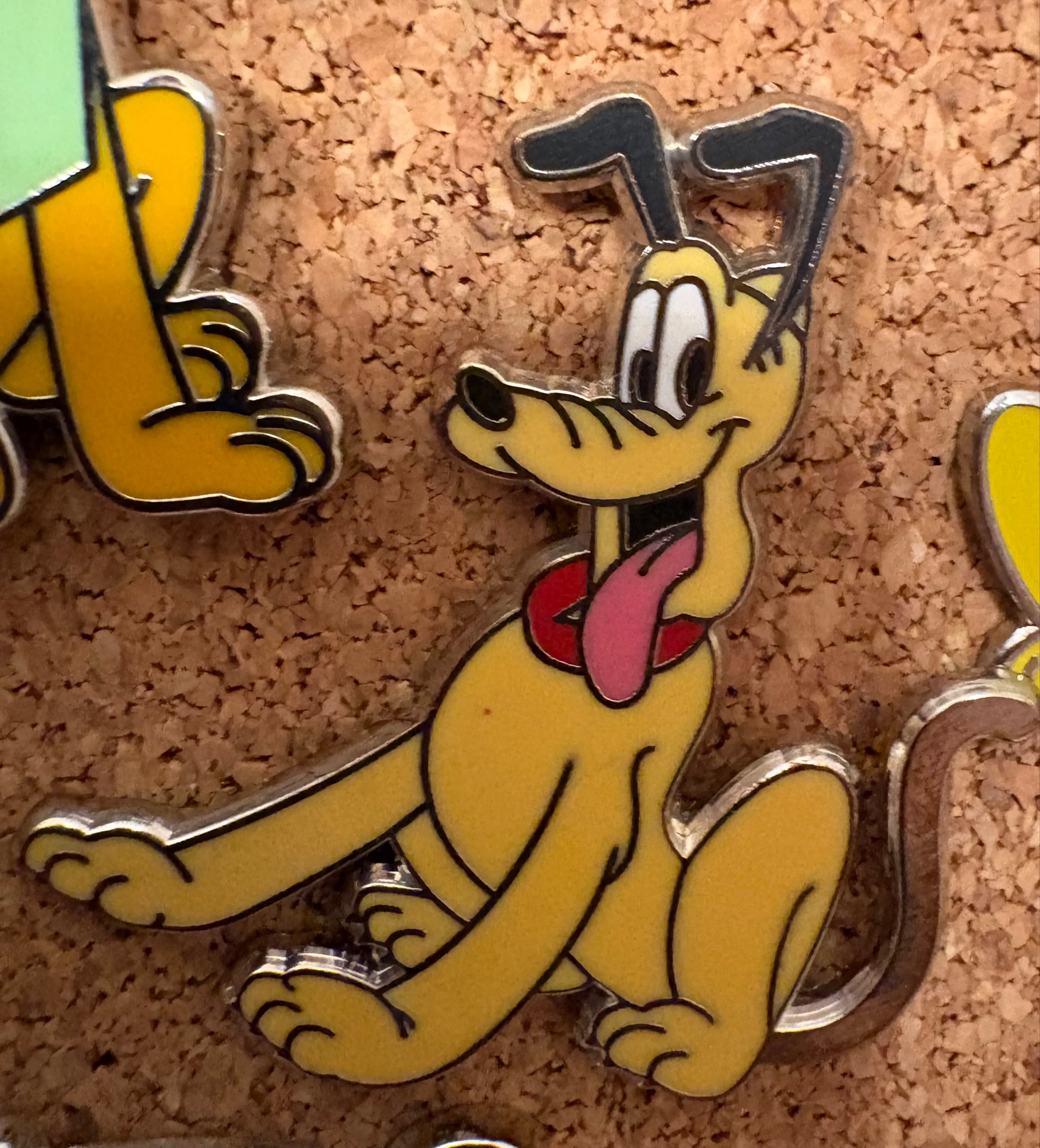 Pluto Sitting with Red Collar