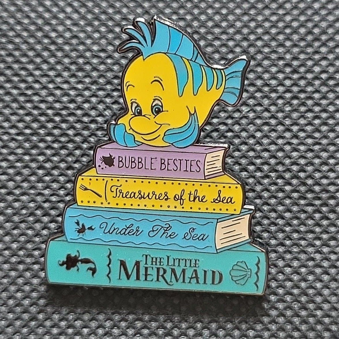 Flounder on The Little Mermaid Book Stack