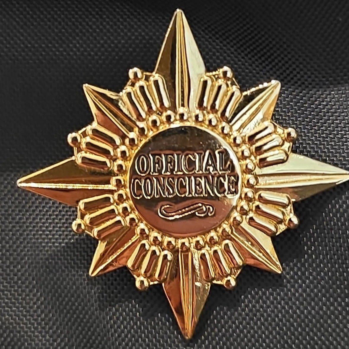 Official Conscience Badge front