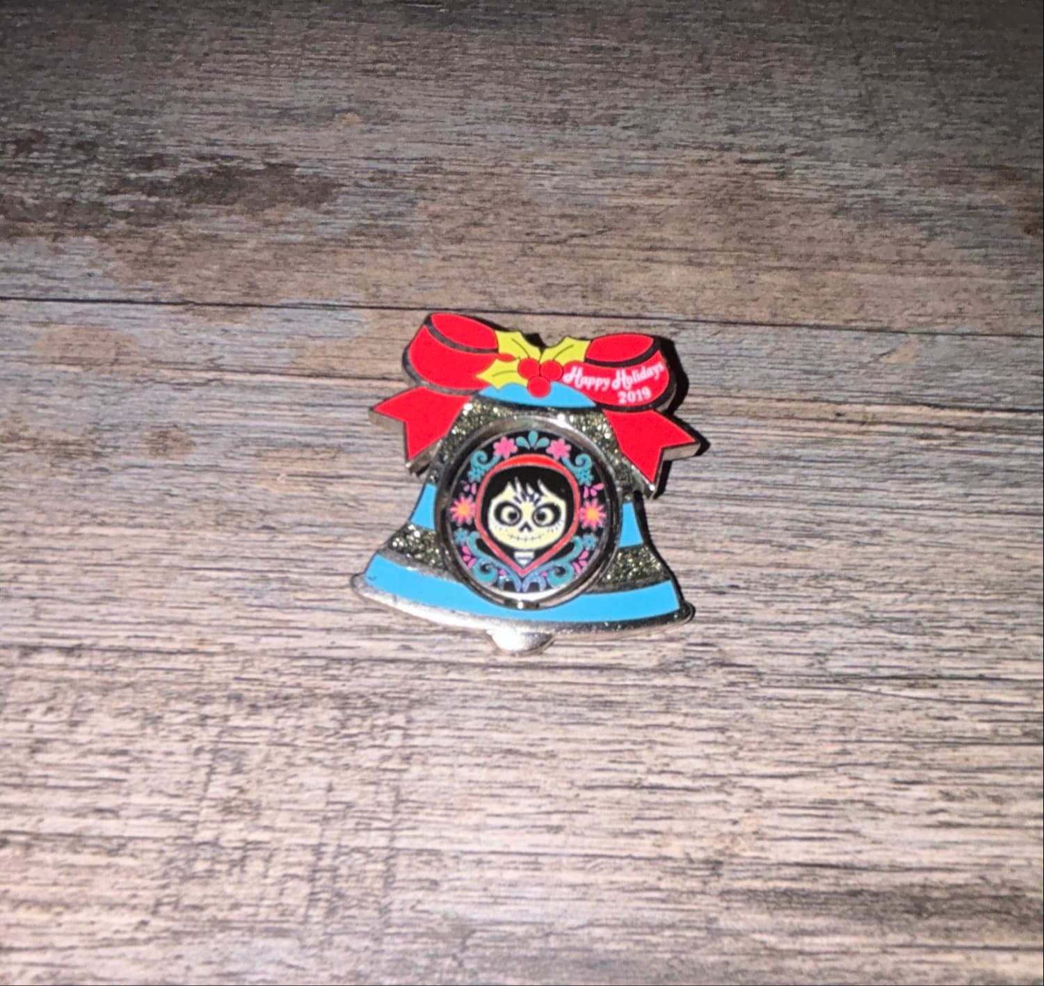 Disney Resort Holidays 2019 Coronado Springs Resort Coco Miguel Bell Spinner Pin front