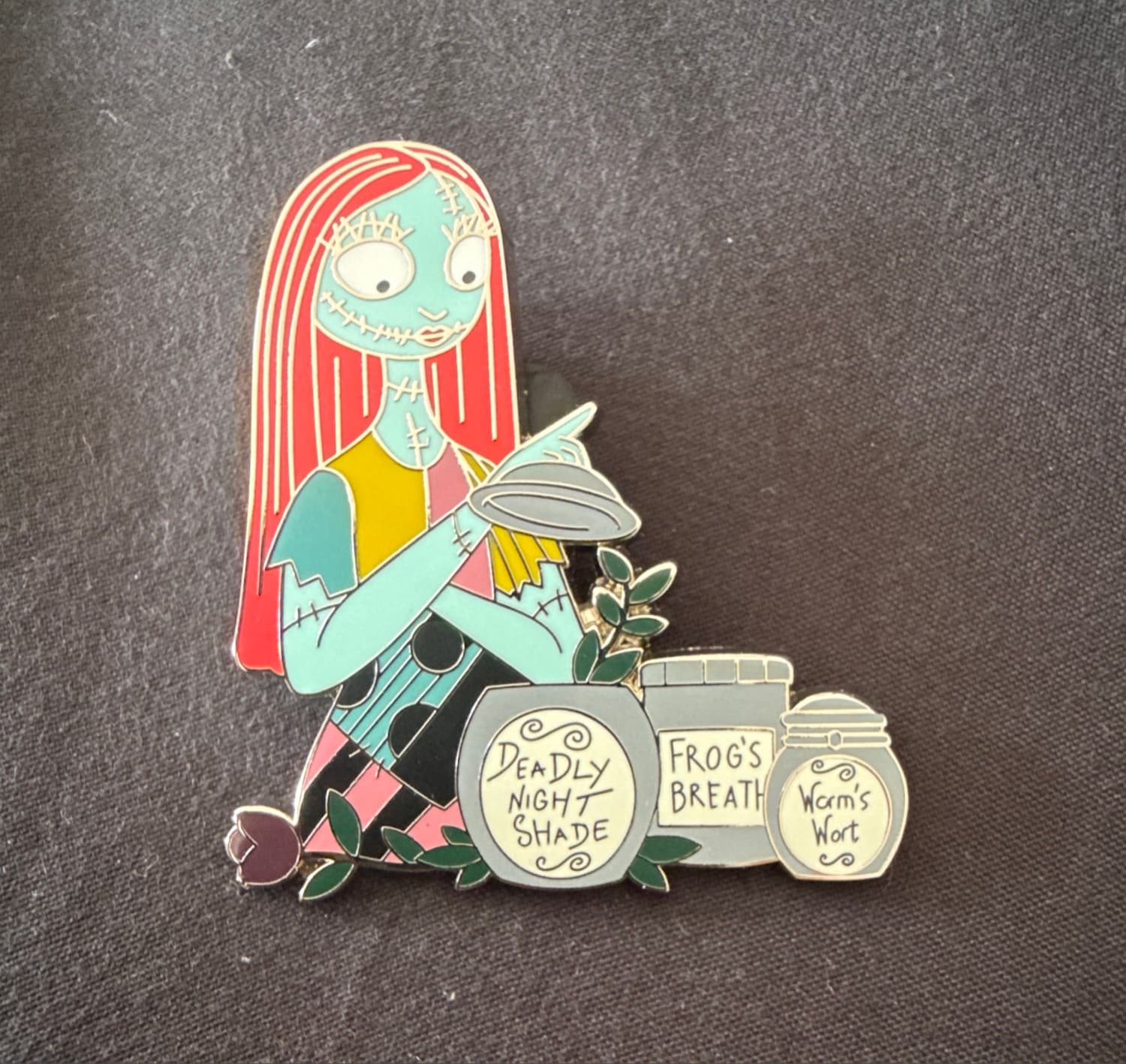 Sally with Jars of Deadly Night Shade, Frog's Breath, and Worm's Wort
