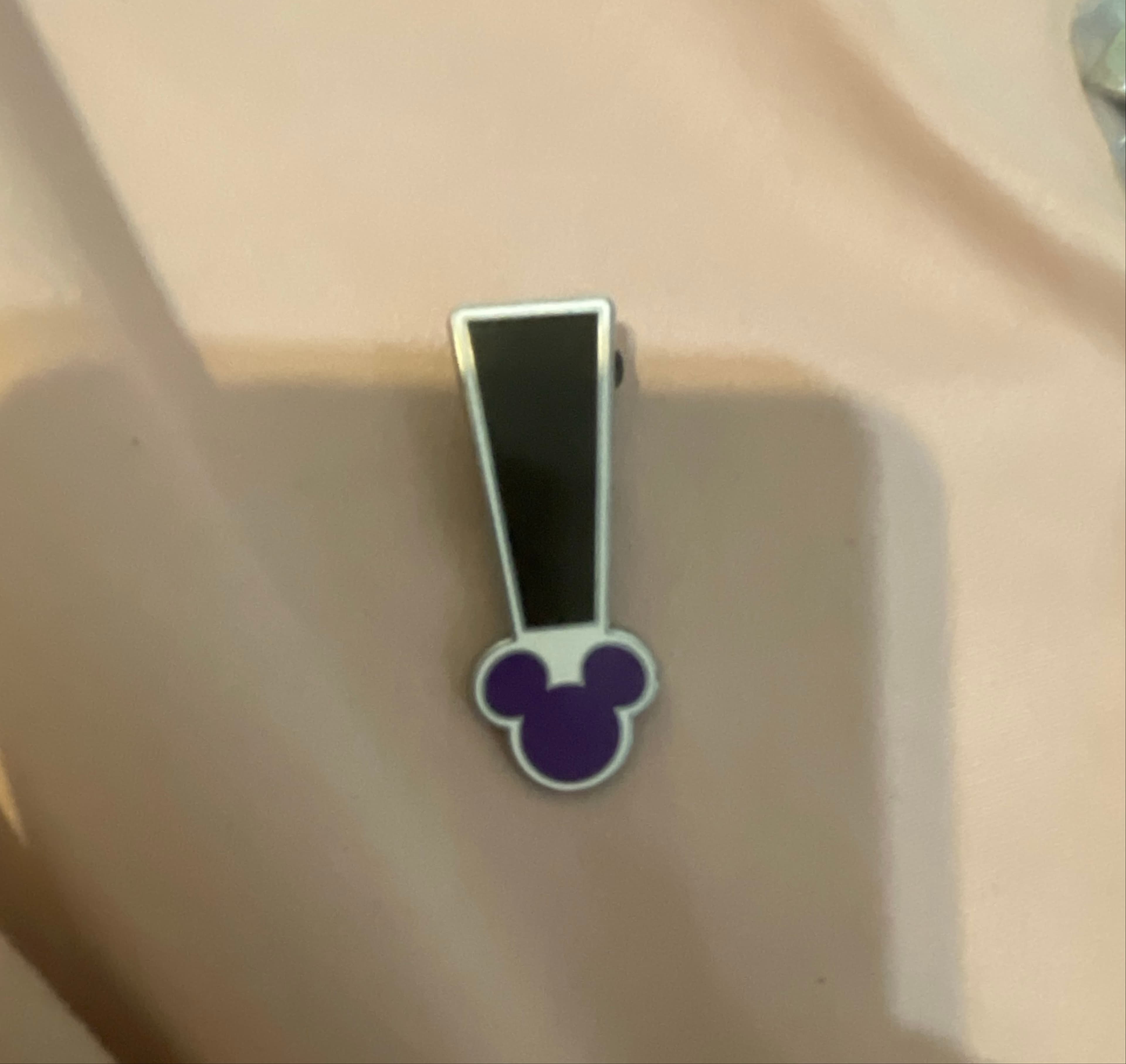 Black Exclamation Mark with Purple Mickey Head