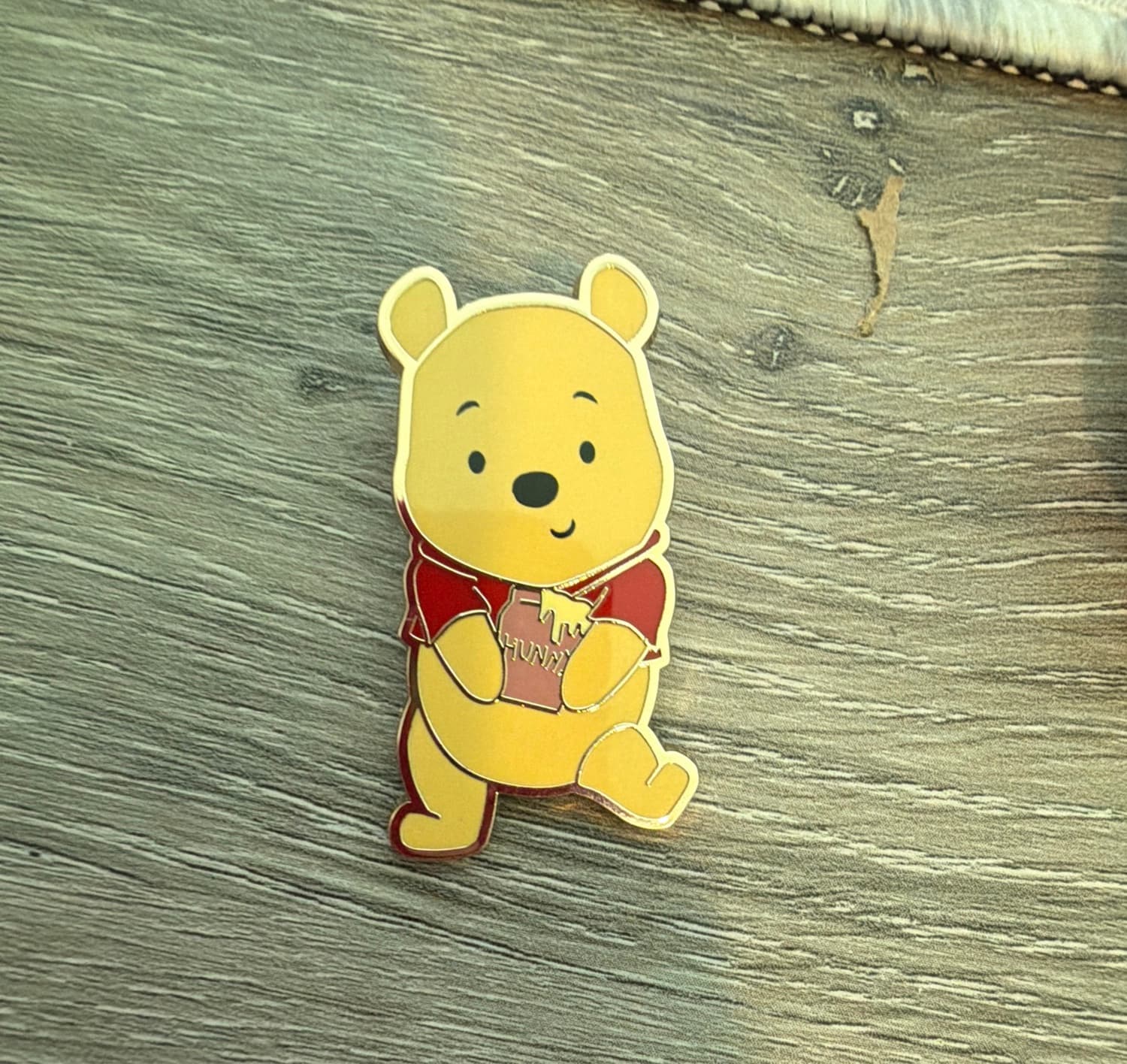 Winnie the Pooh Sitting with Hunny Pot
