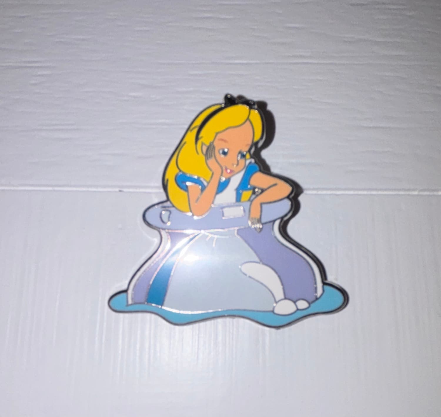 Alice Floating in Bottle