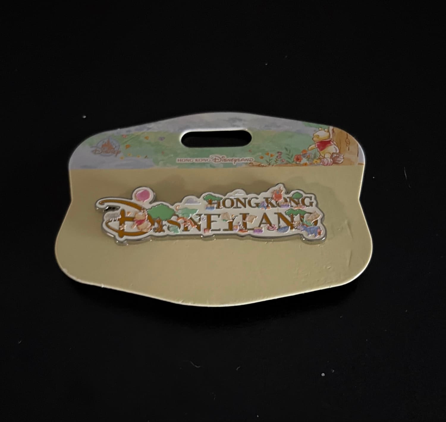 Hong Kong Disneyland Logo with Pooh and Friends