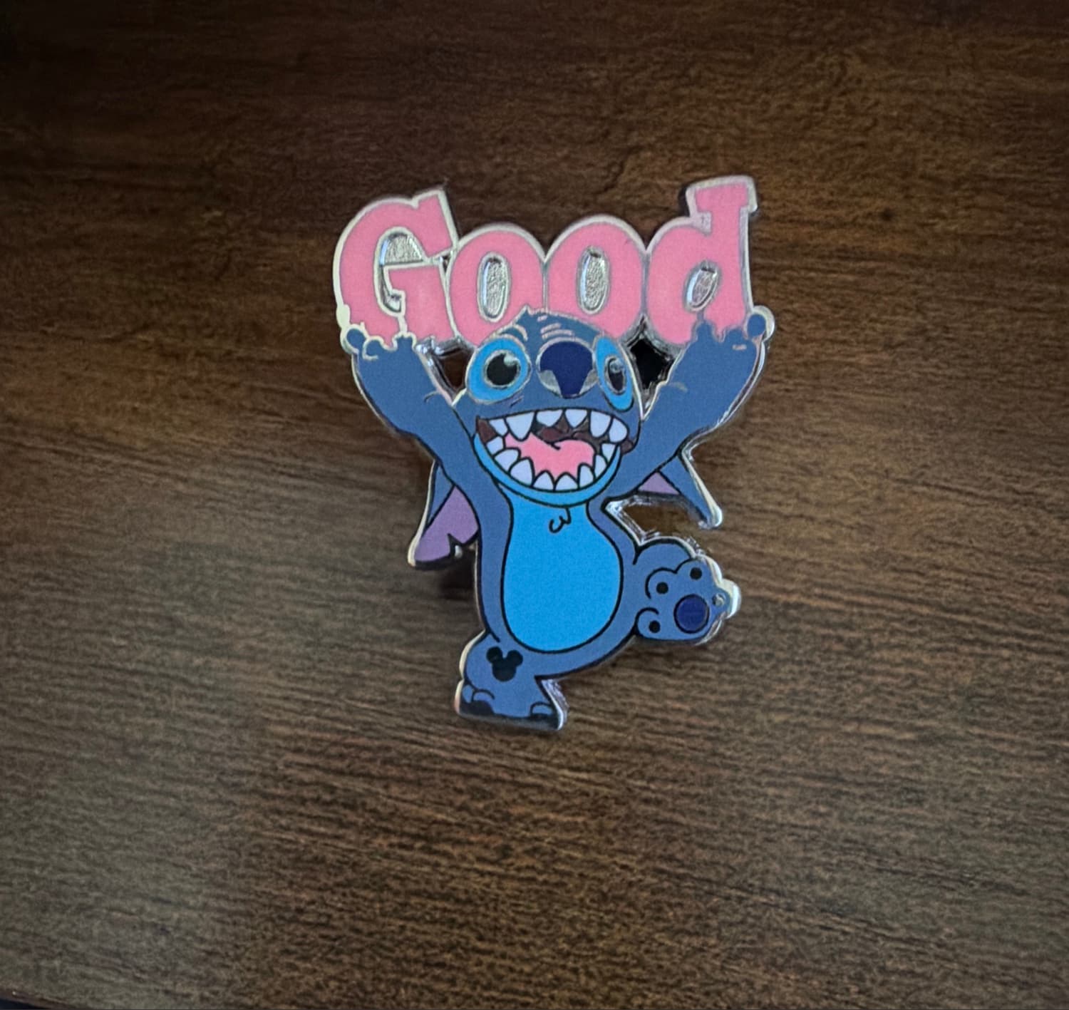 Stitch Holding "Good" Sign front