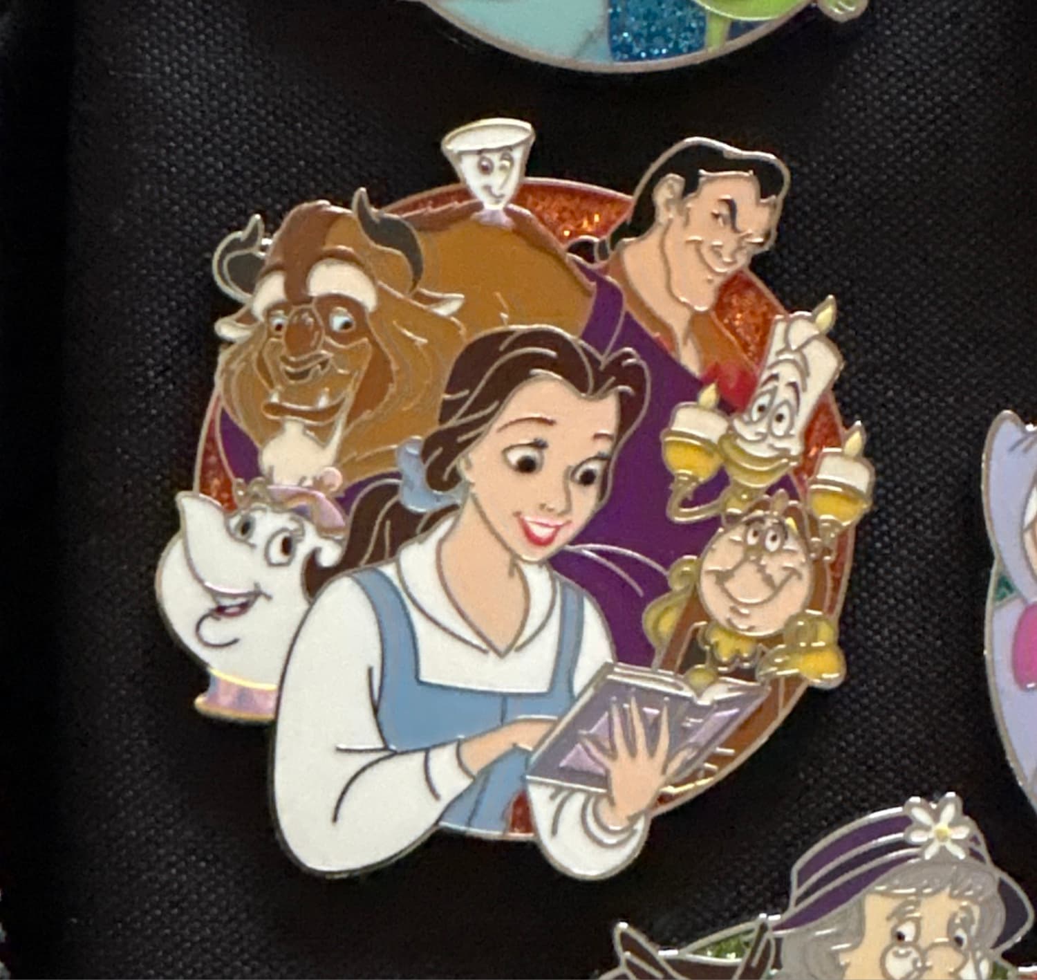 Beauty & The Beast Character Cluster Pin with Belle Reading front