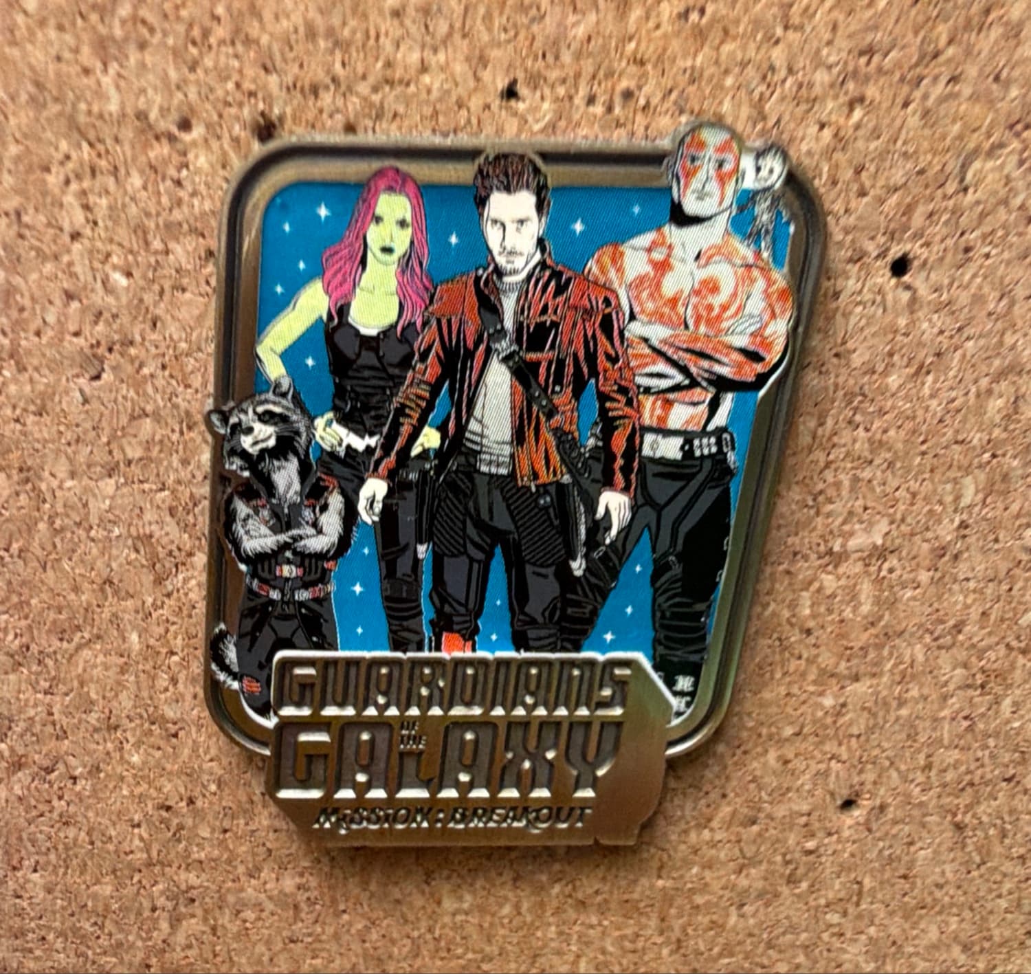 Guardians of the Galaxy Mission: Breakout - Rocket, Gamora, Starlord, Drax and Groot in a Blue Parallelogram front