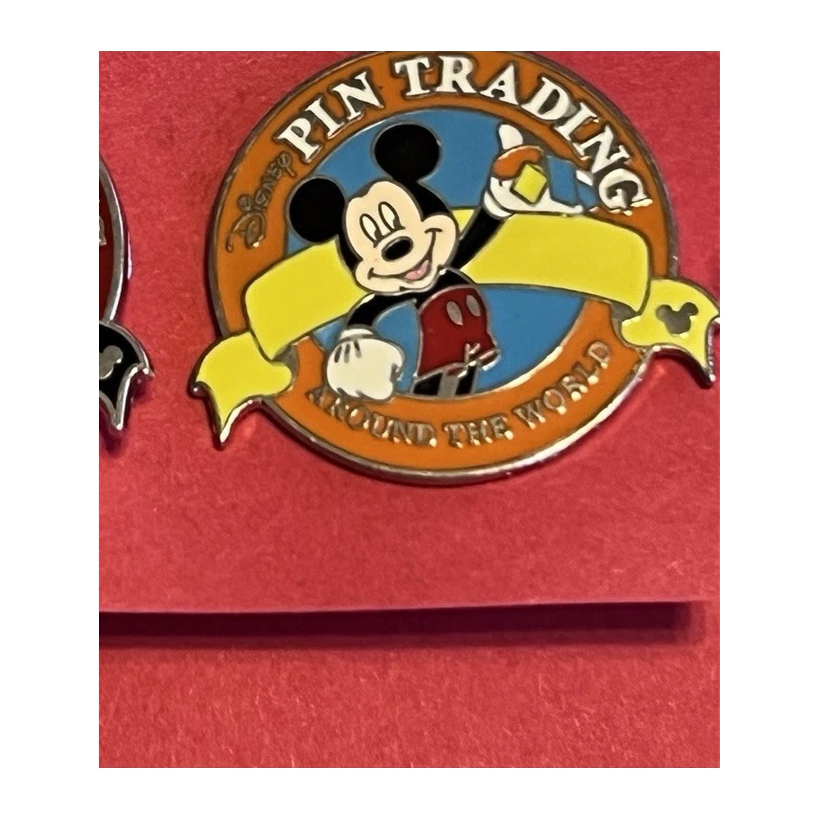 Orange Pin Trading Logo front