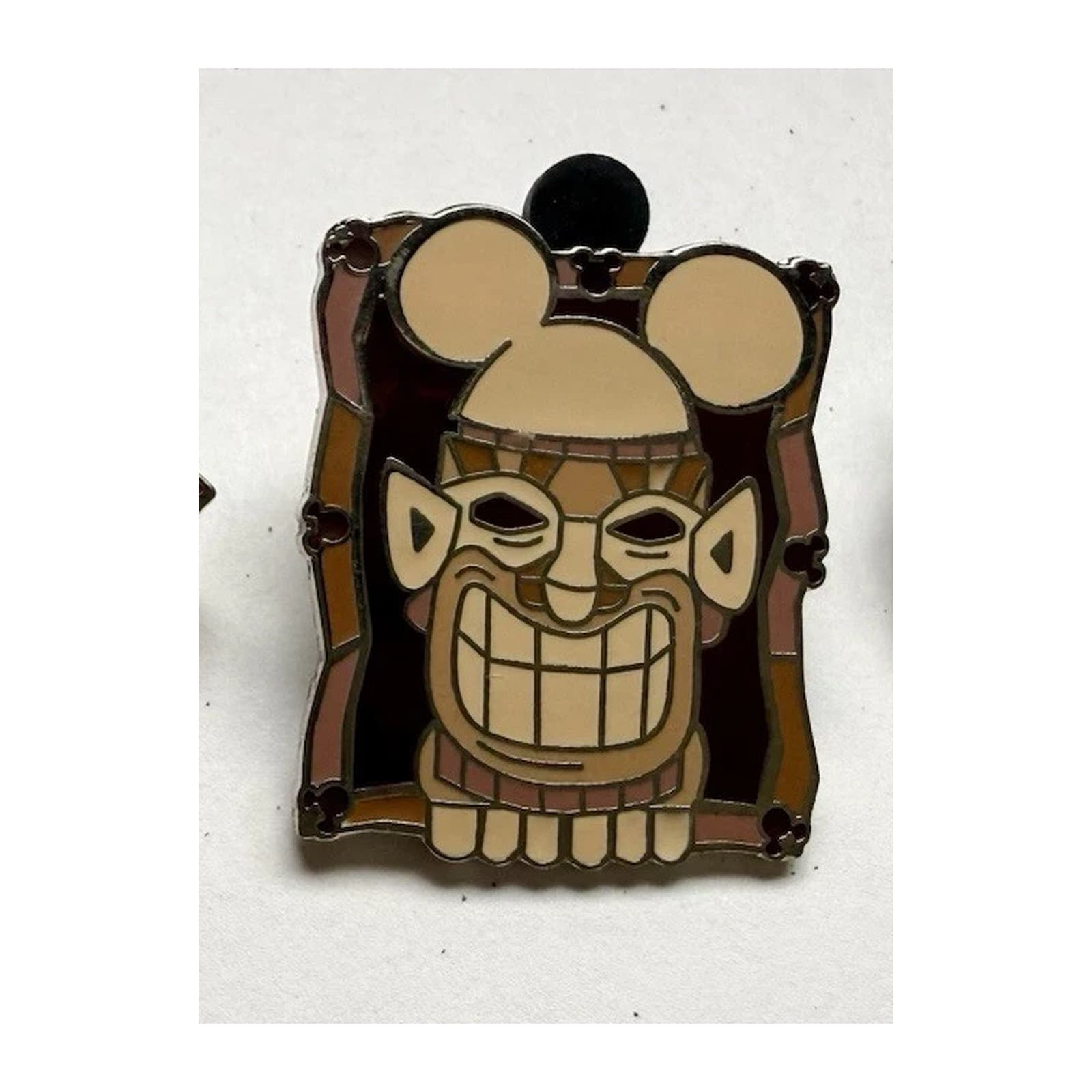 Brown Grinning Tiki Wearing Ear Hat front