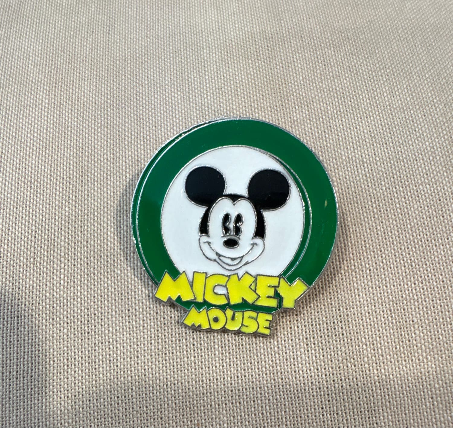 Mickey Mouse Head Green Circle Yellow Text