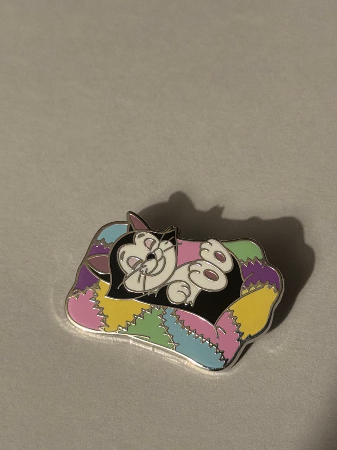 Figaro Sleeping on Patchwork Bed - Sweet Dreams Mystery Collection - Pinocchio front