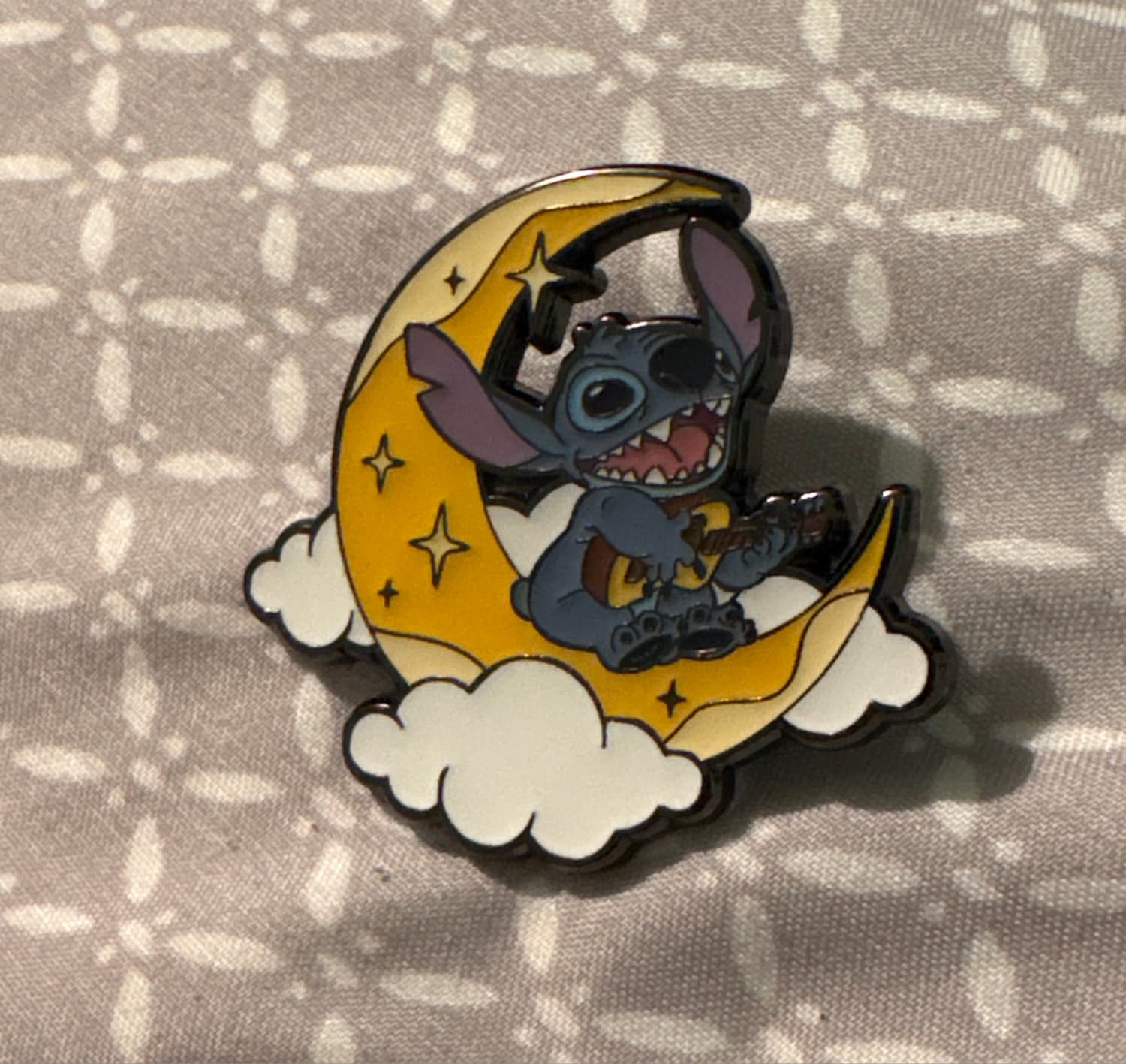 Stitch Sitting on a Crescent Moon and Playing His Ukulele