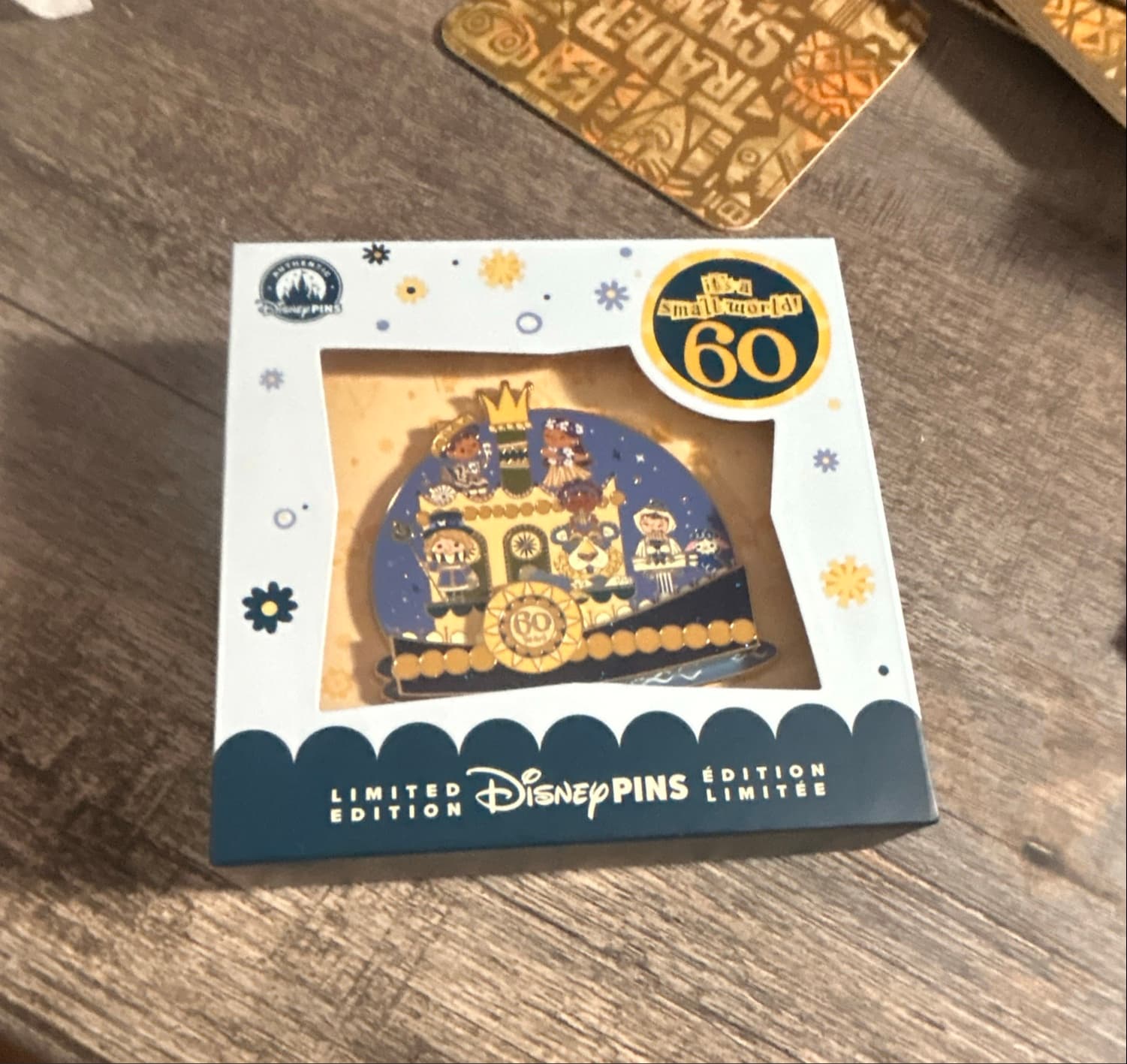 it's a Small World 60th Anniversary Jumbo Pin front
