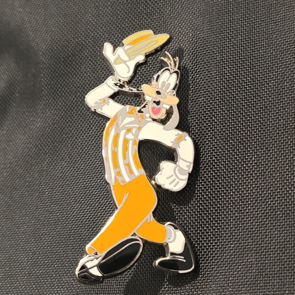 Goofy Wearing an Orange Striped Vest and a Straw Hat