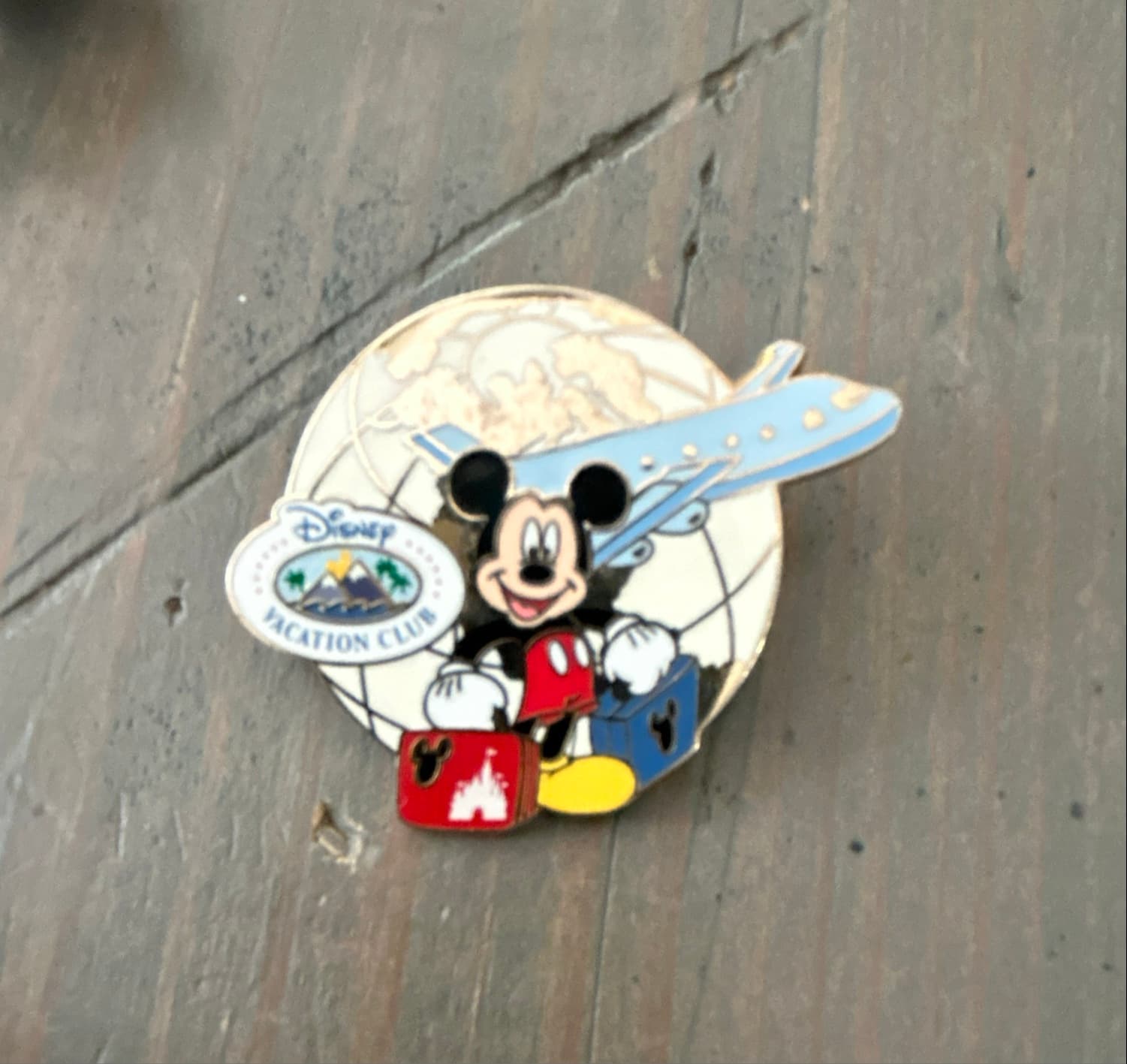 Disney Pin DVC 2010 Traveling Mickey W/Luggage Globe & Jet Airplane front