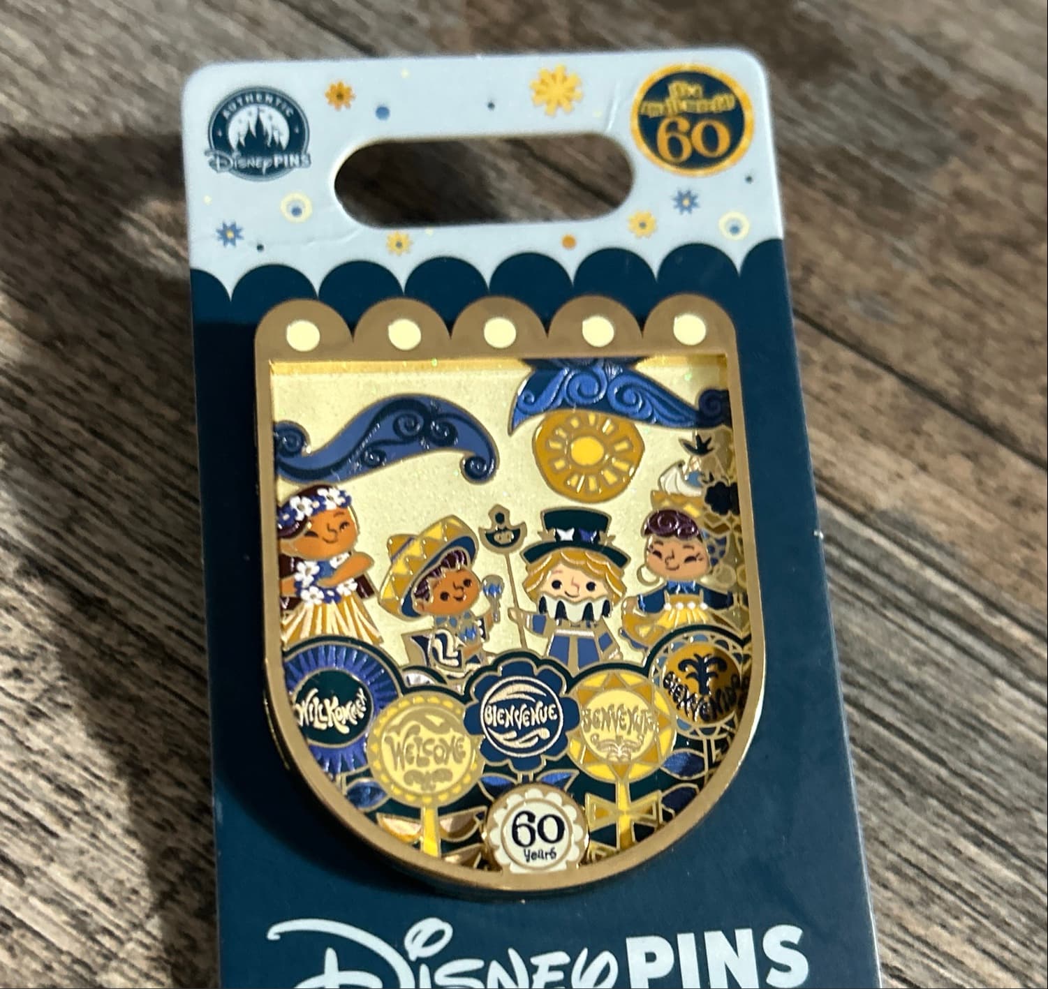 It's a Small World 60th Anniversary Welcome Signs Pin front