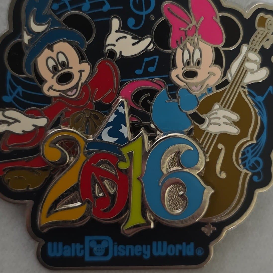 Sorcerer Mickey and Minnie Mouse front