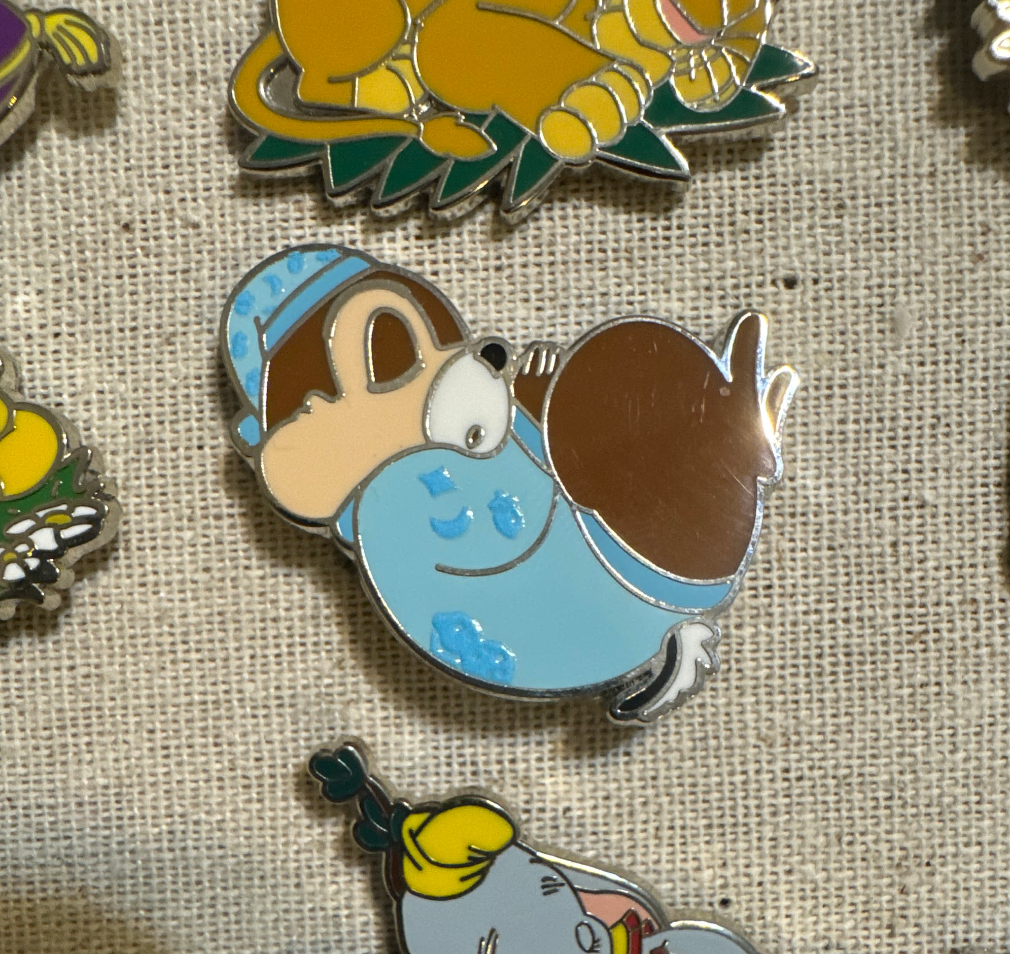 Chip Sleeping in Blue Pajamas with Acorn