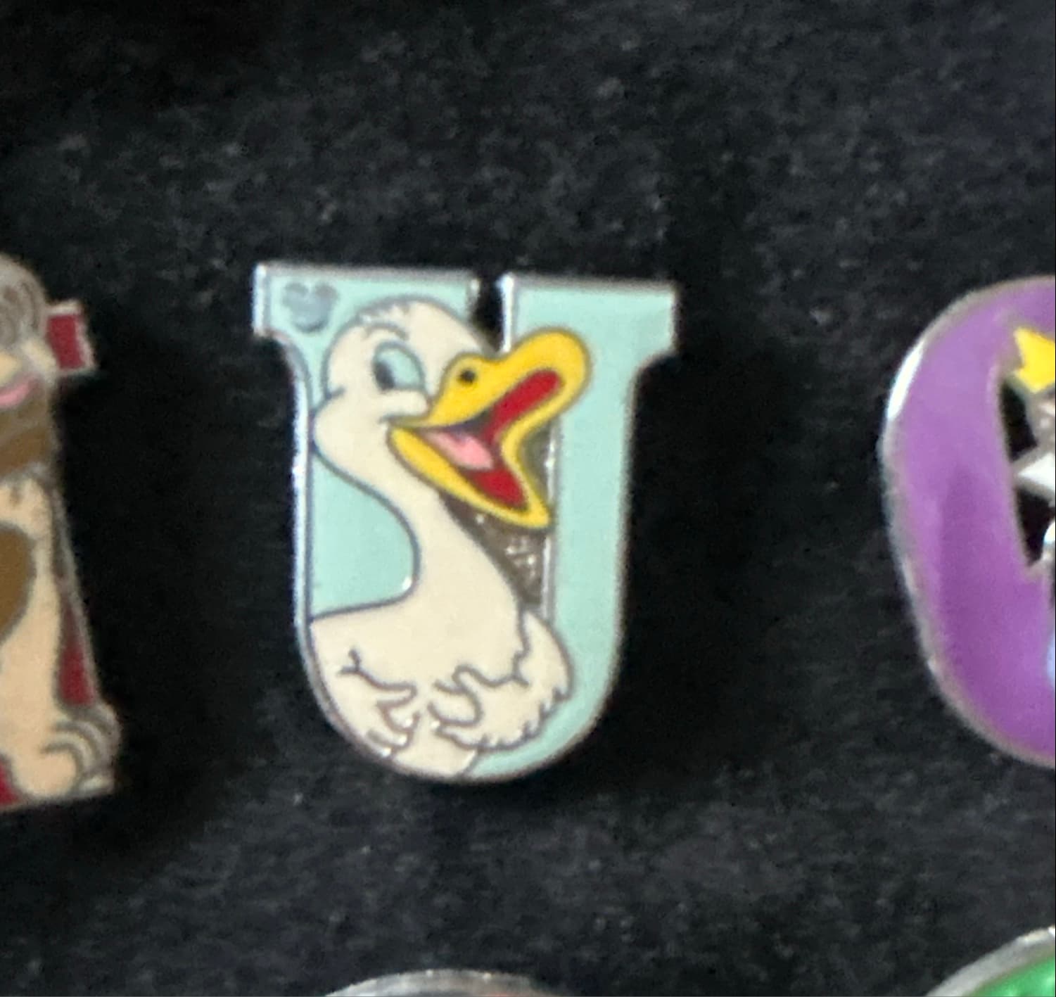 Letter U Ugly Duckling Hidden Mickey Pin front