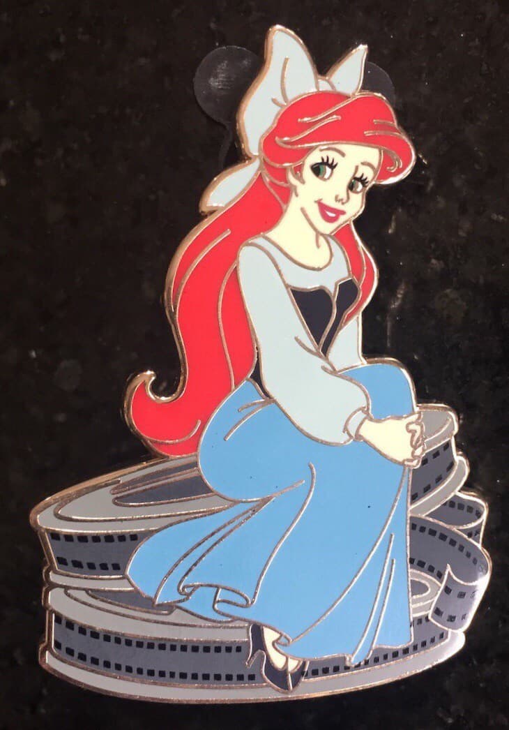 Ariel Sitting on Movie Reels front